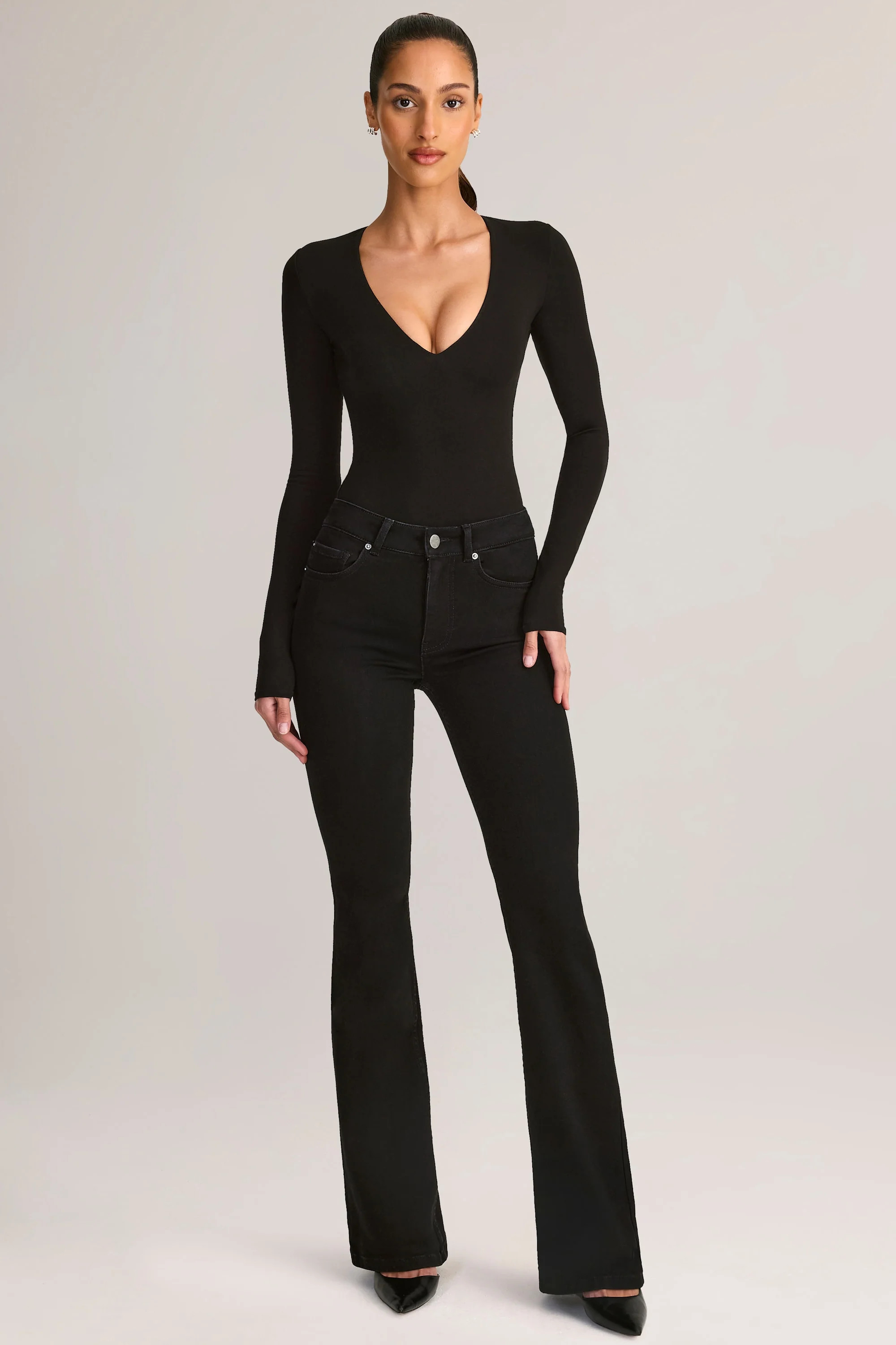 Denim Mid-Rise Flared Jeans in Black | Oh Polly