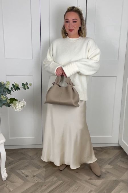 Another colour in the Arket satin skirt, winter whites for Christmas Day 🤍

This is the Numero neuf bag in Taupe from Polene Paris 

#LTKstyletip #LTKSeasonal #LTKmidsize