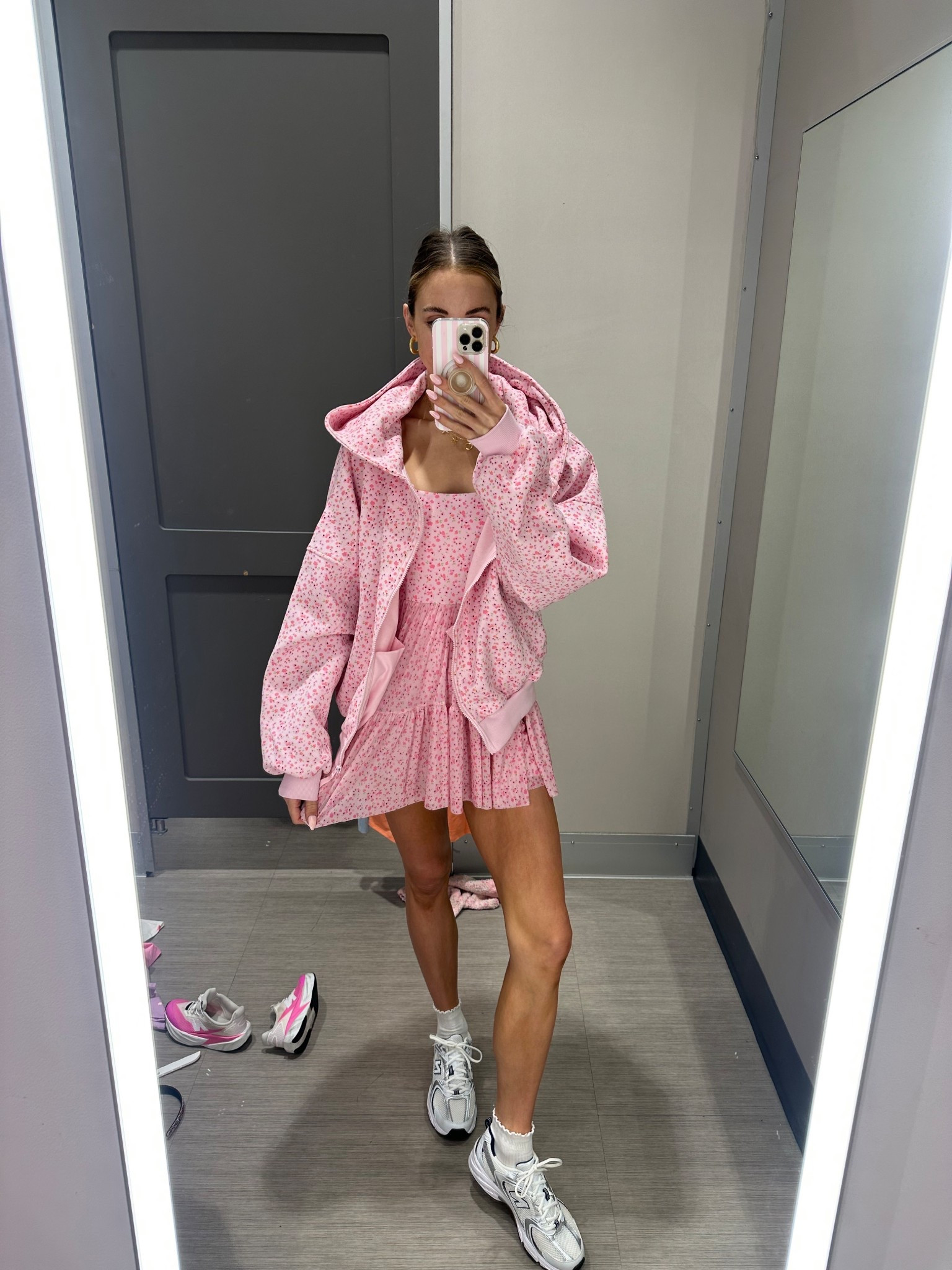 Runs small. I’m wearing. Medium in the dress and large sweatshirt 