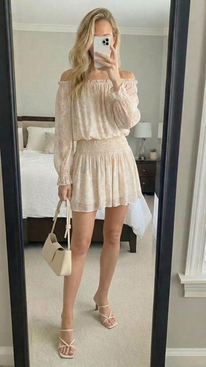 Aritzia perfection! 🤍✨
This off-shoulder dress from Aritzia is absolutely stunning! The romantic paisley print, smocked waist, and flowy silhouette make it so dreamy and feminine!
What I love about this dress:
✨ Beautiful neutral paisley print
✨ Flattering off-shoulder neckline
✨ Smocked waist is so flattering
✨ Long sleeves with elastic cuffs
✨ Flowy, feminine skirt
✨ Aritzia quality is exceptional
The off-shoulder style is so romantic and the smocked waist creates a beautiful silhouette! The paisley print is subtle but gorgeous. Love how the long sleeves balance the off-shoulder neckline!
Styled it with nude strappy heels and a cream handbag for an elevated look. This dress is perfect for so many occasions!
This dress is ideal for:

Bridal showers
Baby showers
Date night
Summer events
Vacation dinners
Wedding guest (outdoor)
Girls night out

The neutral color palette makes it so easy to accessorize! Aritzia dresses are always worth the investment!
Shop this Aritzia dress by following me in the LTK app 🛍️ 

 #LTKfinds #LTKstyletip #LTKunder100 #aritzia #aritziastyle #offshouldetdress #paisleydress #smockeddress #summerdress #romanticdress #weddingguest #bridalshower #nudeheels #creamhandbag #ootd #outfitinspo #dressseason #sophisticatedstyle #femininestyle