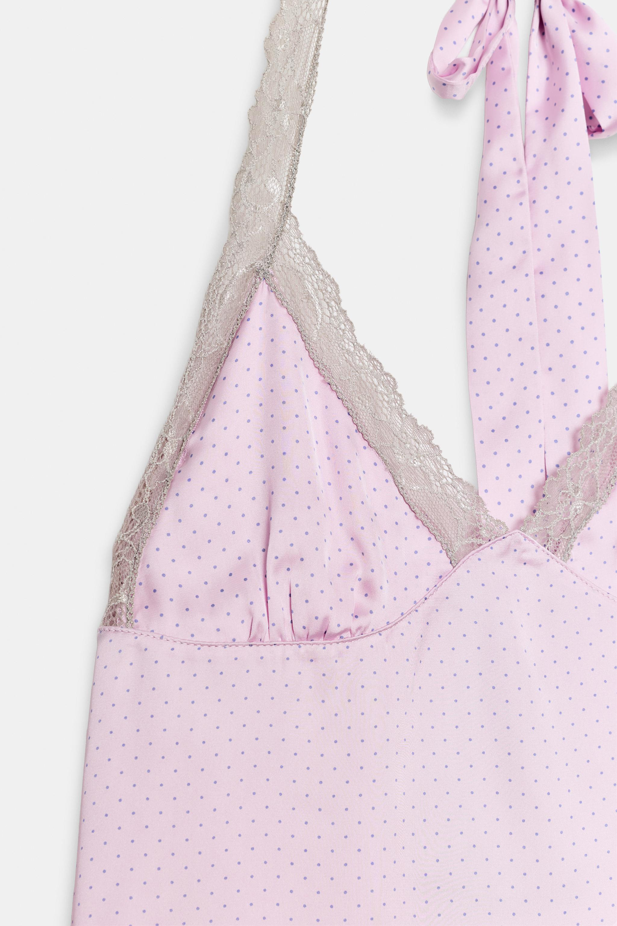 Halter neck top with V-neckline. Contrasting lace detail. Side closure with invisible in-seam zip... | Zara US