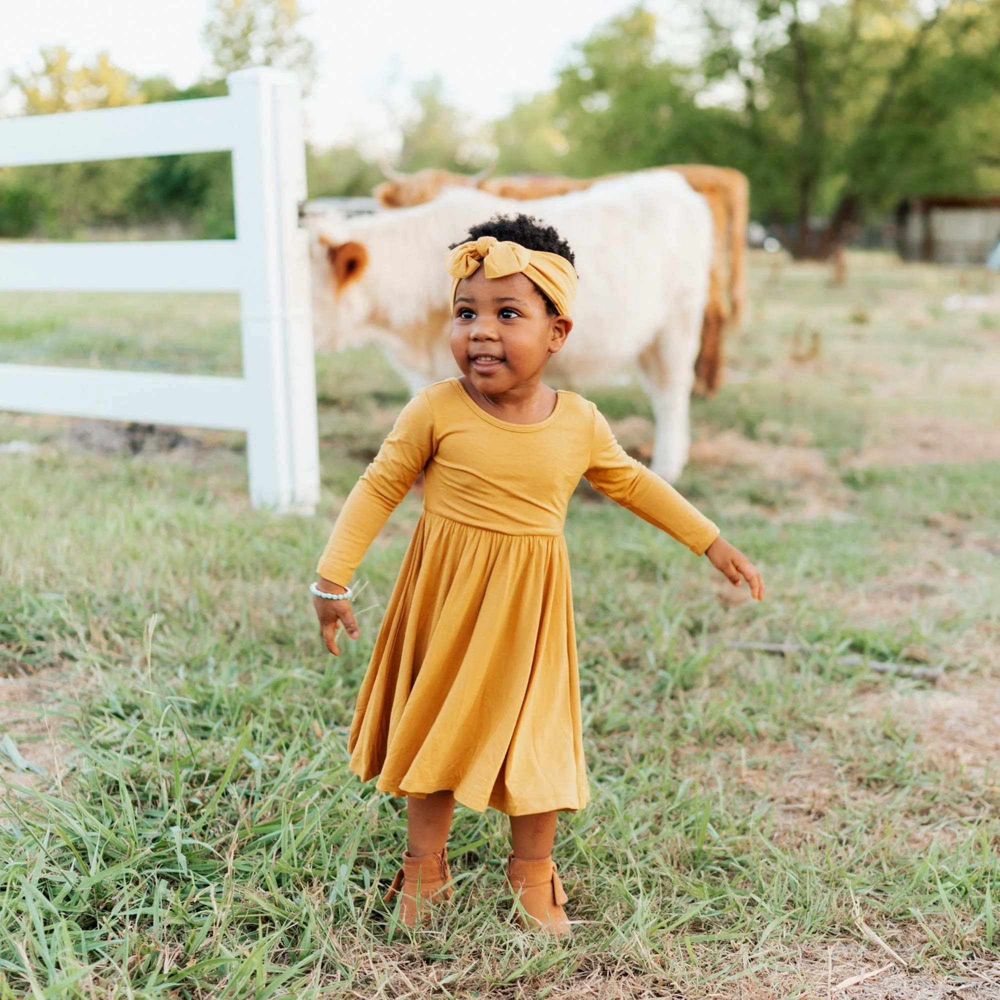 Long Sleeve Twirl Dress in Marigold | Kyte BABY