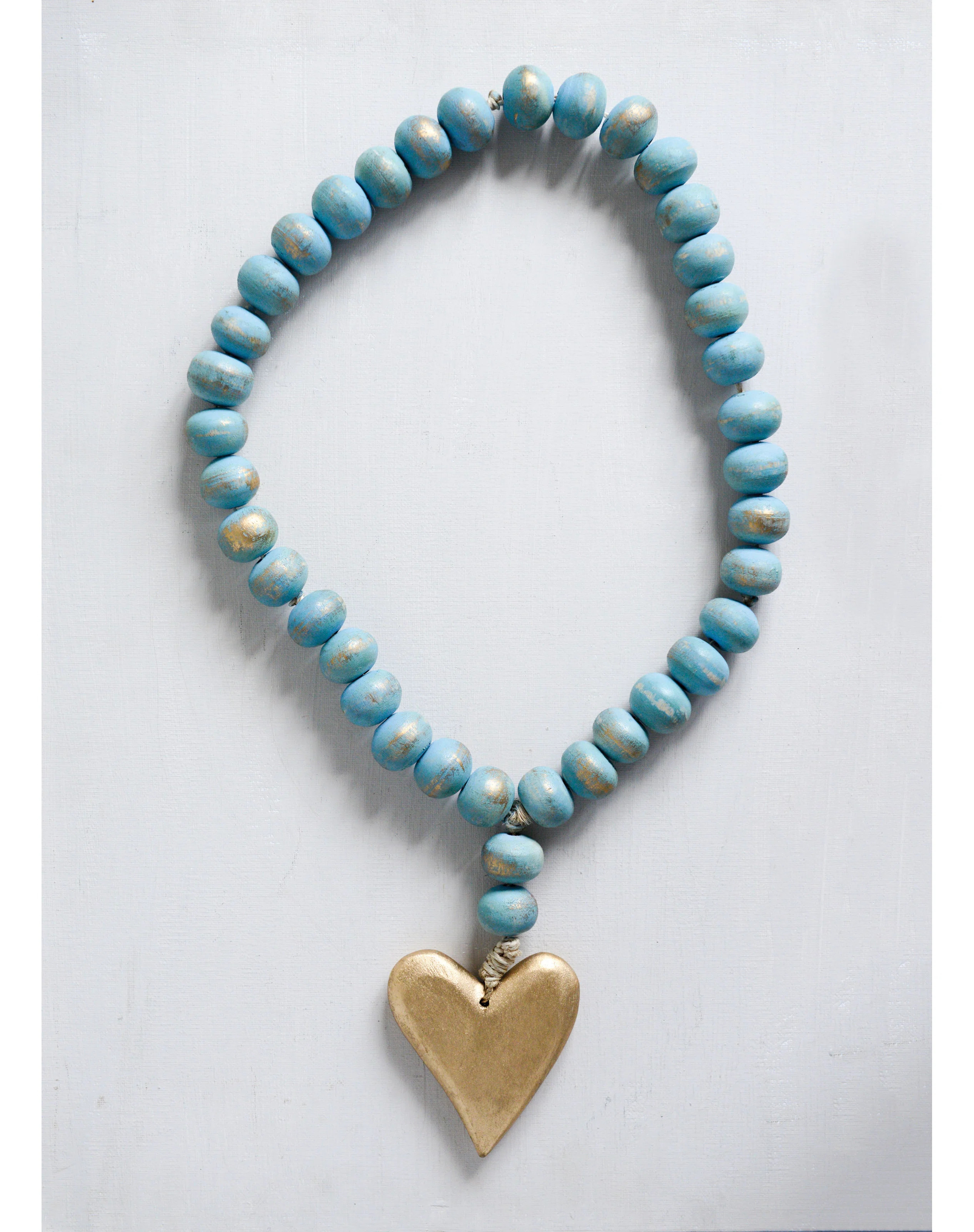 Highland Dunes Adalwine Mango Wood Bead Strand with Heart & Reviews | Wayfair | Wayfair North America