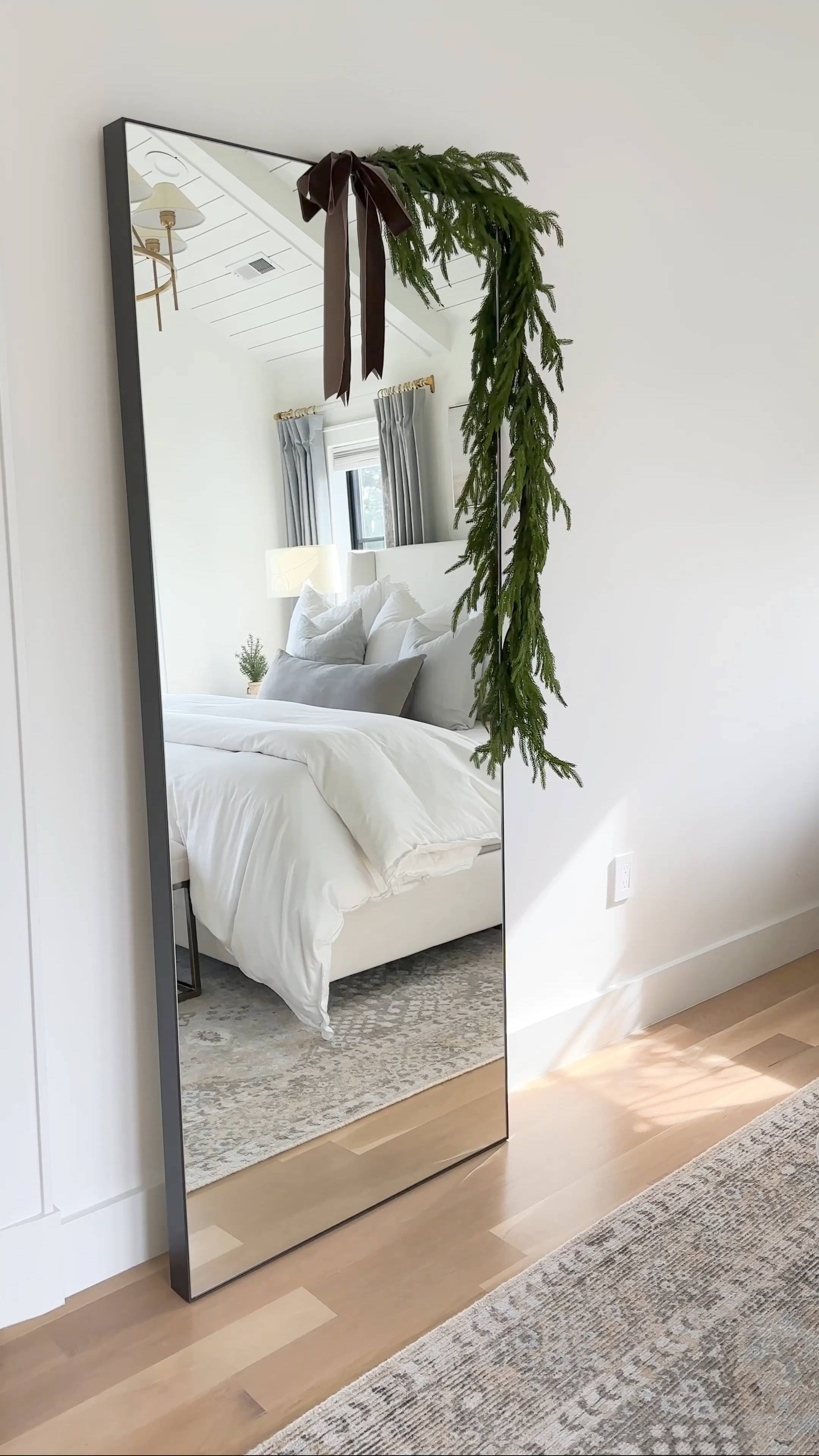 Our primary bedroom decorated for Christmas! I hung some Norfork pine garland on my floor mirror with brown velvet ribbon. I added a small wreath to my art and I’m loving these pre-lit white birch trees from Amazon.  

-Uphosltered Bed is a king size in Zuma white
-Sheets & duvet cover are white and SO soft! Worth the splurge!
-Waffle bed blanket is the natural color
-Art was a lucky Homegoods find, but I’m linking the same print on stretched canvas from Walmart! -The 24x47” size is the closest match and perfect for over a king size bed 
-wreath was from a small shop, but I’m linking a similar one from Pottery Barn!
-Curtains are mineral blue with light filtering lining.
-My rug is currently sold out! Check back for restock updates


#LTKhome #LTKVideo #LTKHoliday