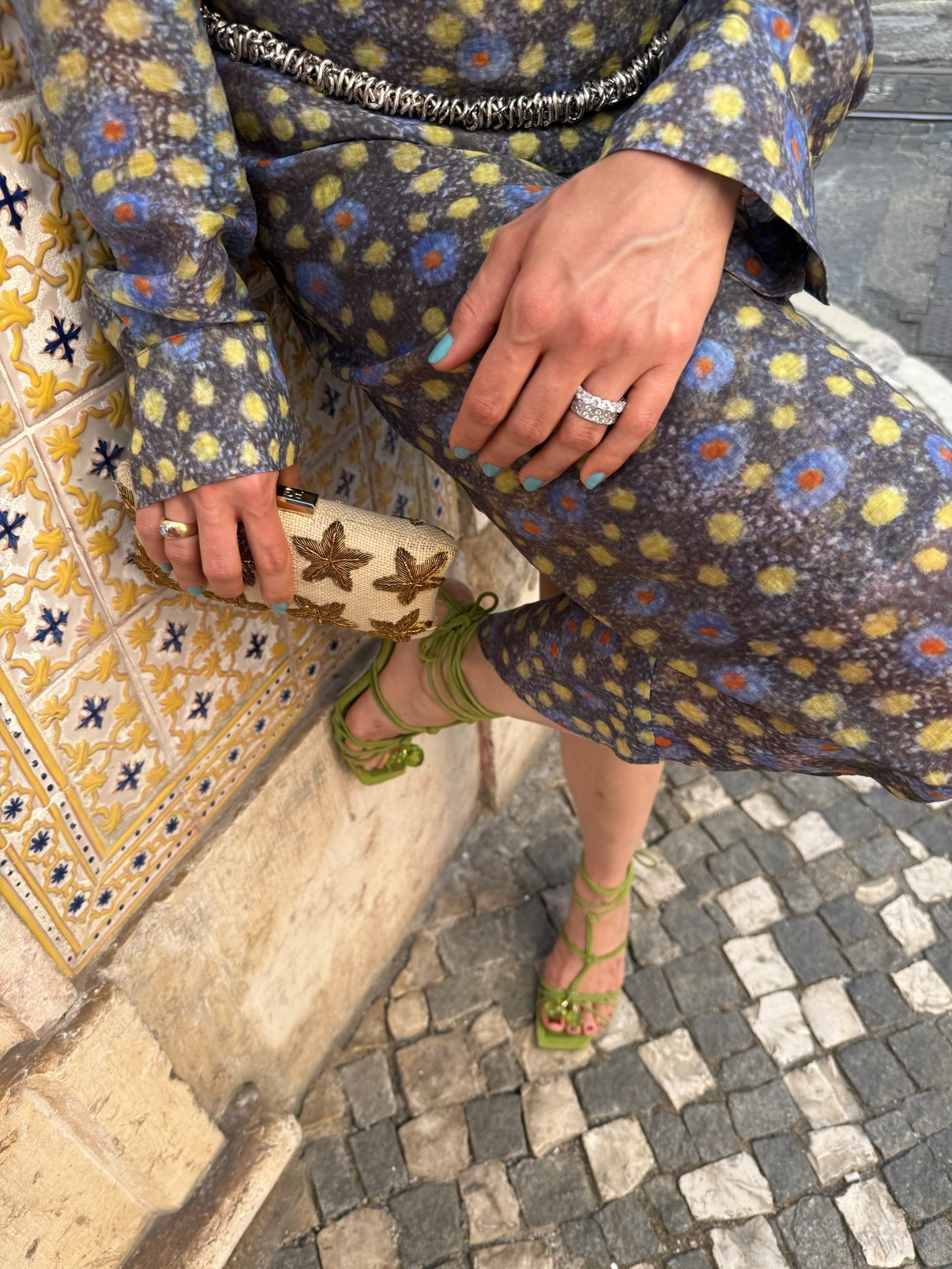 European summer strolling through old town! 🇵🇹✨ Loving this eclectic high-fashion look featuring a gold sequin triangle bikini top styled under a matching off-the-shoulder floral jacket and midi skirt set. Pop of green with strappy sandals and a embellished clutch completes the vibe. Everything is linked below! 💛🛍️

#LTKootd #LTKgrwm #LTKTravel