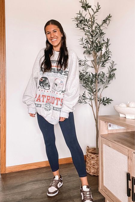 Game day outfit, NFL sweatshirt 
Oversized sweatshirt, wearing XL

Abercrombie and Fitch 
Abercrombie style 
Leggings 
Game day outfits 
Football outfit, footballs style
Chicago bears
Nike sneakers, dunks 
Amazon fashion 
Fall outfit 

#LTKSeasonal #LTKstyletip #LTKunder100