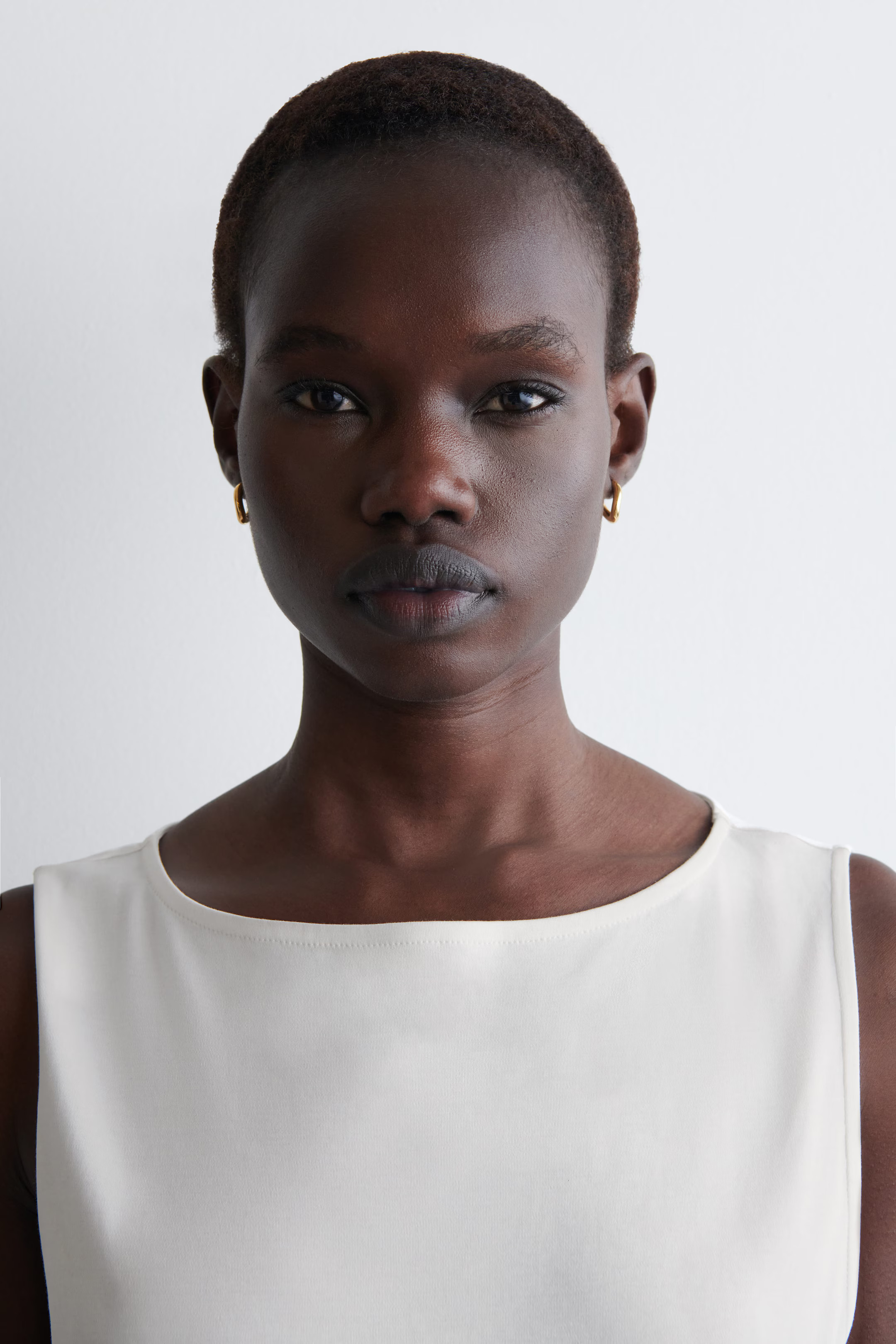 TWISTED HOOP EARRINGS - GOLD | COS | COS UK