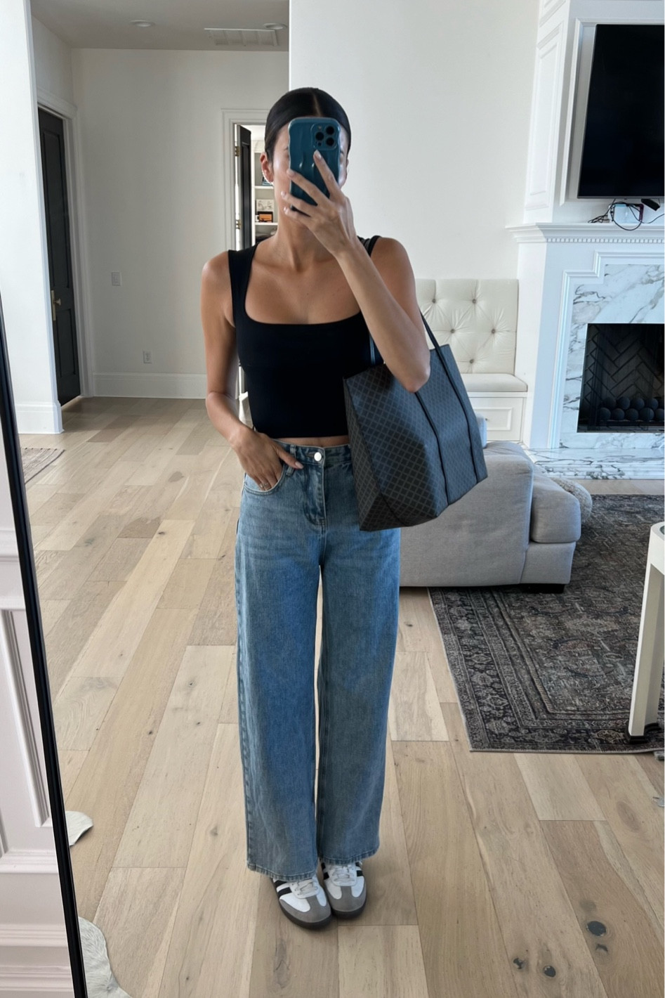 Casual outfit today - transitioning to fall with these straight leg jeans and this flattering tank top! I love this tank I have it in multiple colors & it’s under $20🤩 these jeans are so cute and comfy - I’m wearing size small. I love that they’re straight leg but fit really well in the waist and they are a little shorter so your shoes show. 

fall outfits; fall style; casual outfit; work outfit; wide leg denim; straight leg denim; amazon fashion; H&M; work tote; black tote; adidas sambas; Christine Andrew 

#LTKfindsunder50 #LTKstyletip #LTKSeasonal