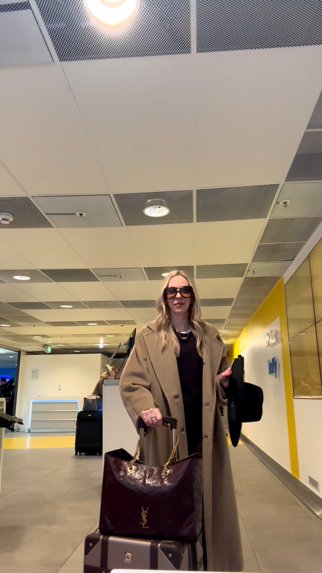 Airport outfit, camel coat, Amazon joggers, burgundy YSL tote, travel style, casual chic

#LTKdayinmylife #LTKTravel #LTKootd