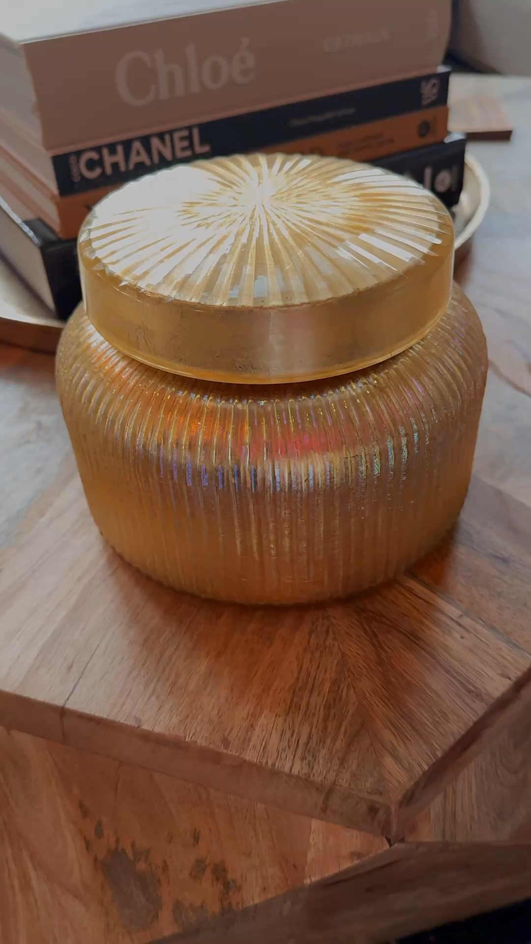 I always buy a large or X-Large sized Capri Blue Volcano candle from Anthropologie when they go on sale for Christmas! Glass colors and designs vary each year—this gold has me like 🤩 I light this candle when we have guests over and it usually lasts me about 9 months. So worth the $$! 

#LTKFindsUnder100 #LTKGiftGuide #LTKHome