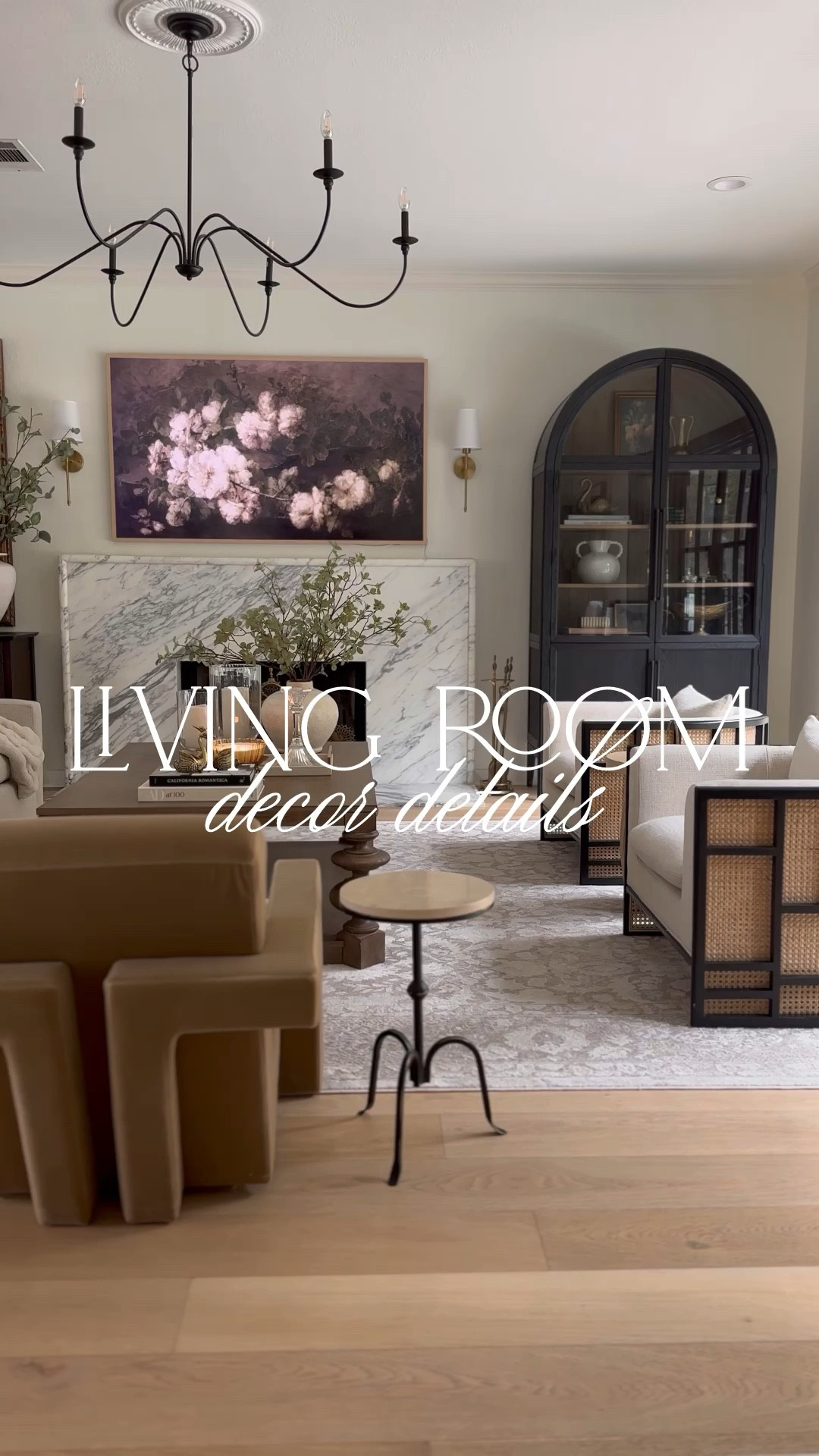 Living room decor! Including my fluted and marble top side tables, tall greenery stems (I used 5 here), rug in Beige/Cream, coffee table decor (I used 2 packs of stems), arched cabinet, and wireless sconces!

#LTKHome #LTKSaleAlert #LTKStyleTip