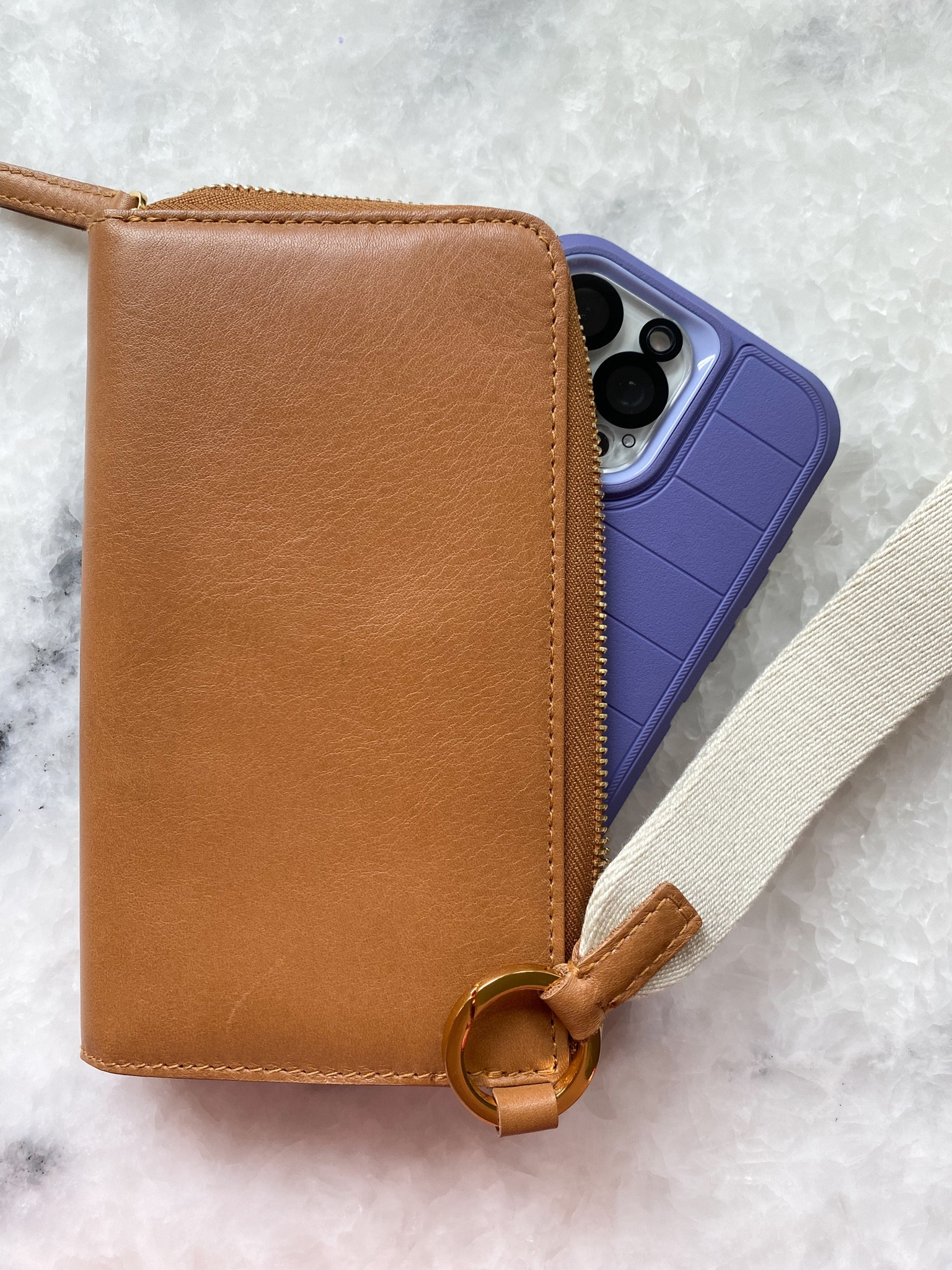 Leather wristlet holds my phone and cards 🙌🏼

#LTKGiftGuide #LTKxMadewell #LTKtravel