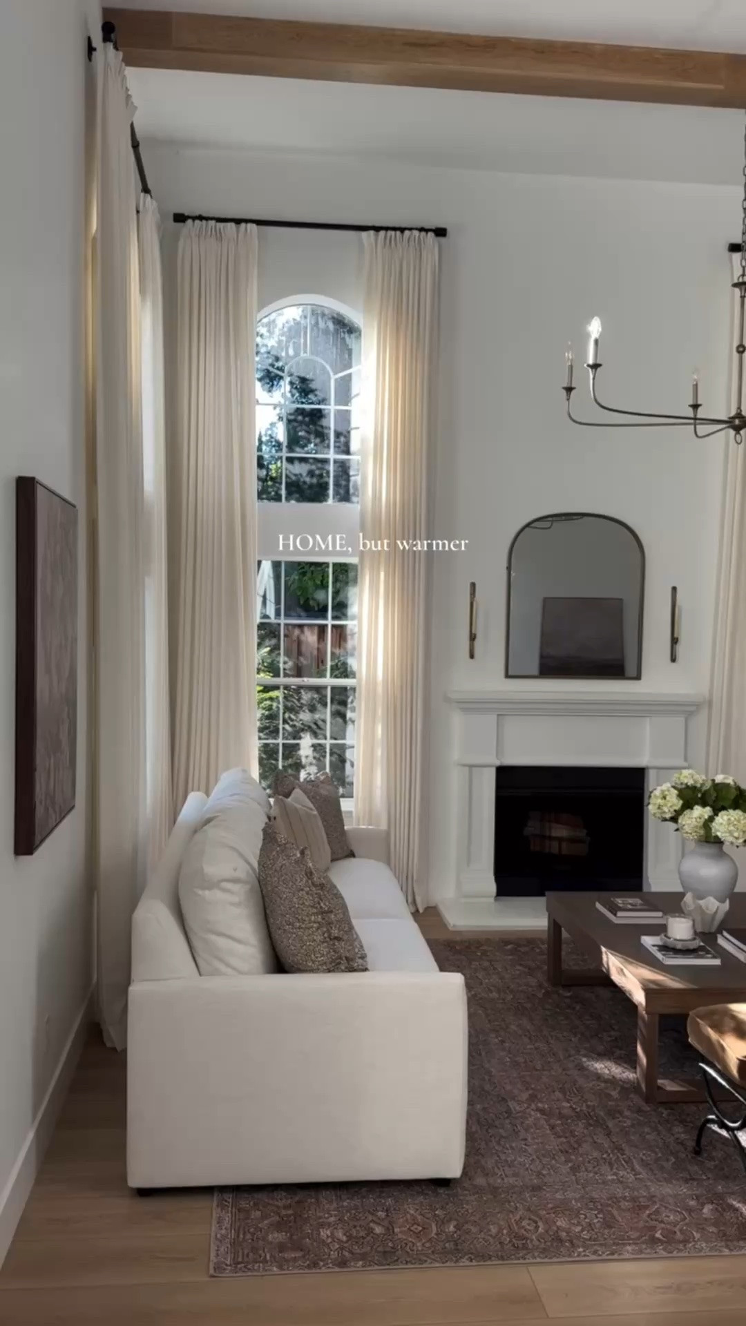 Same home, but so much warmer. 🤎✨

I’ve always loved this view coming down the stairs, but adding more warmth completely changed the feeling. The earthy tones, different materials, lighting, and thoughtful details make the space feel so much cozier and more lived in.

Living room decor, living room furniture, entryway decor, console table styling, coffee table styling, chandelier, organic modern decor, vintage style rug.

#LTKHome #LTKU #LTKSeasonal