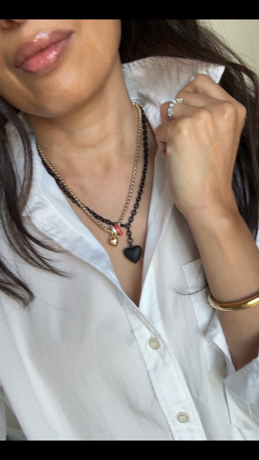 New necklace styled 4 ways  
I love the edgy chic look to this matte black heart necklace. Especially against a white top. 
Pairs well with:
-silver (necklace shown is the same style)
-gold (charm necklace shown is my most worn lately)
-pearls (for a more feminine vibe. Code Naomi20 to save)
-bling (to dress up for evening)
Exact button down is all cotton in an oversized style. True to size. Also linking the classic fit version. 
Favorite lip oil in shade pointelle. 


#LTKFindsUnder100 #LTKStyleTip #LTKOver40