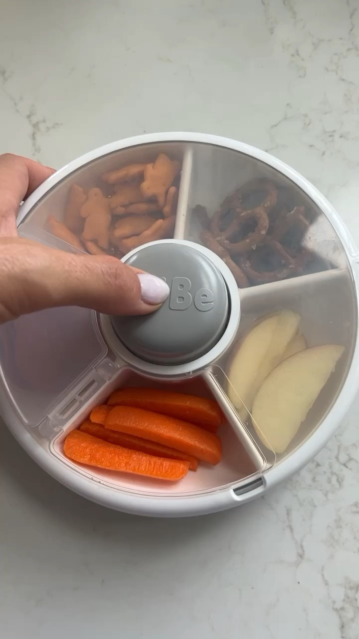 Amazon rotating snack tray that makes snacking fun! We save this for long walks, road trips and travel so it’s always a novelty. 

#LTKFamily #LTKKids #LTKFindsUnder50