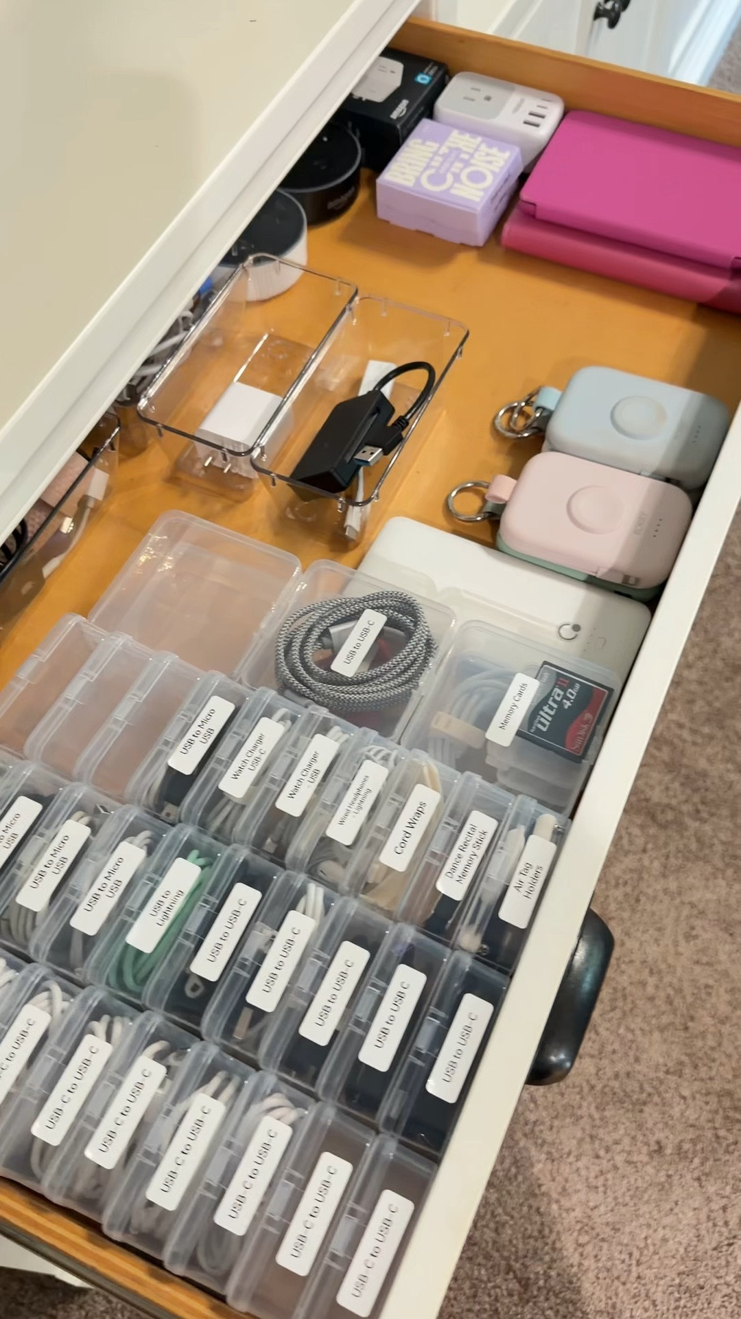 The cord drawer chaos is officially over and I am never going back 🙌 I grabbed these small acrylic cases from Amazon, used my label maker to label each one, and the difference is unreal. Every cord, charger, and cable has a home now and I can actually find what I need without losing my mind. This is the kind of organization win that makes me irrationally happy.

#LTKHome #LTKSaleAlert #LTKSeasonal