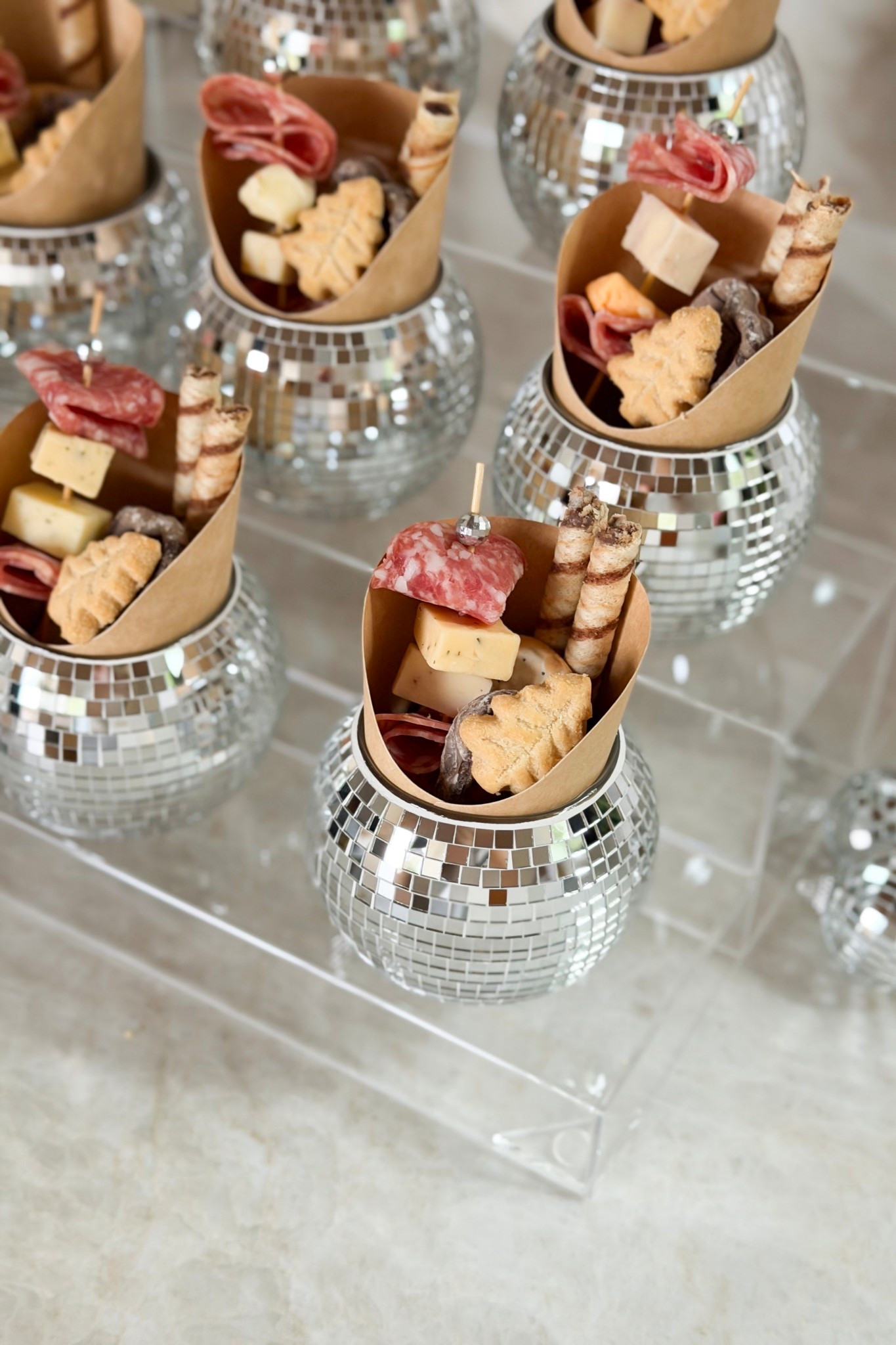 Such a fun way to serve snacks for a New Year's Eve party!

party, party ideas, NYE, new years, new year's eve, party host, disco ball, charcuterie cups, NYE party, NYE hosting, Amazon finds 

#LTKHoliday #LTKSeasonal #LTKfoodie