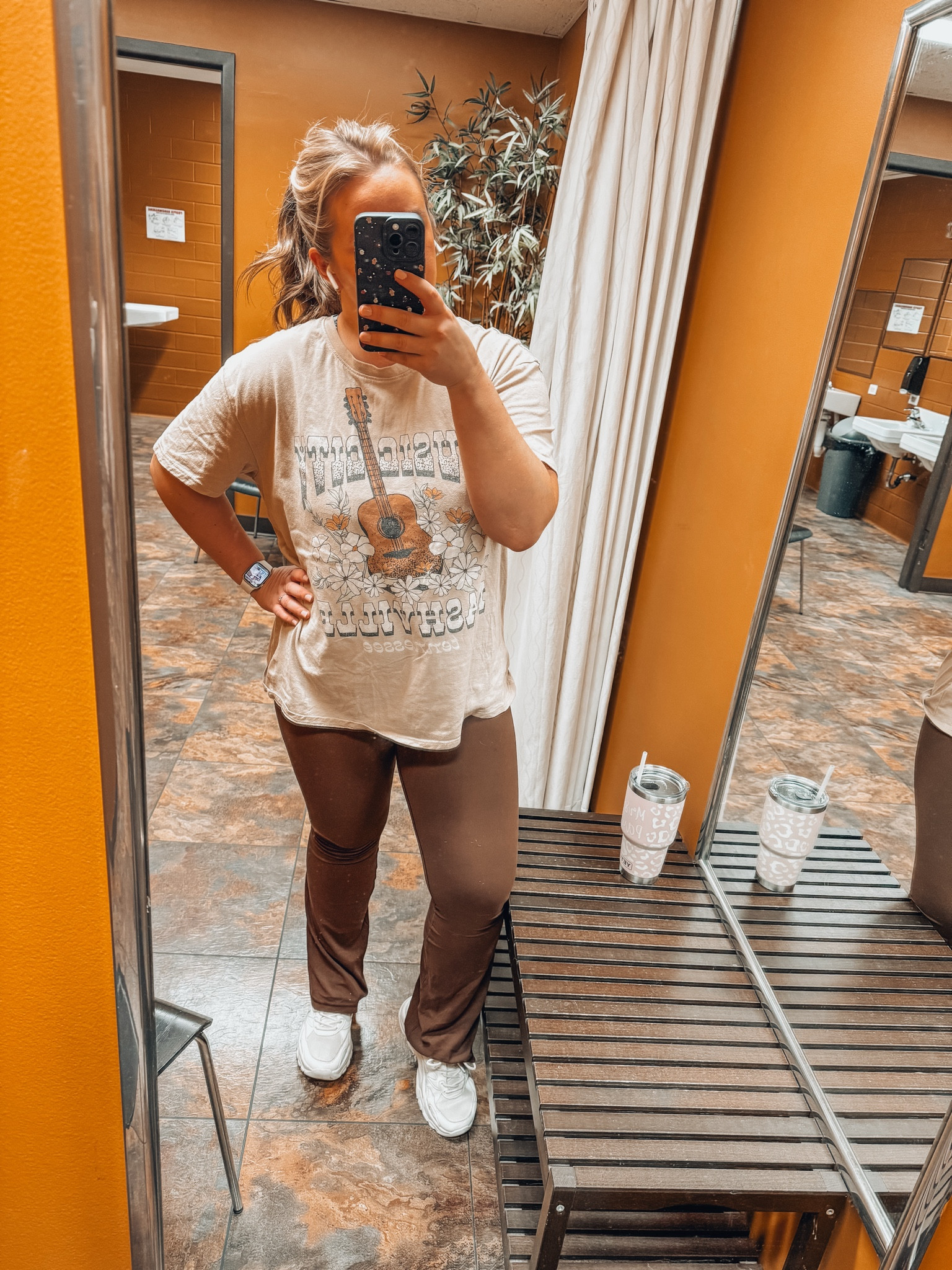 Gym workout walking outfit - high rise buttery soft flare leggings - chunky white walking sneakers - oversize Nashville graphic tee 

#LTKActive #LTKMidsize #LTKFitness