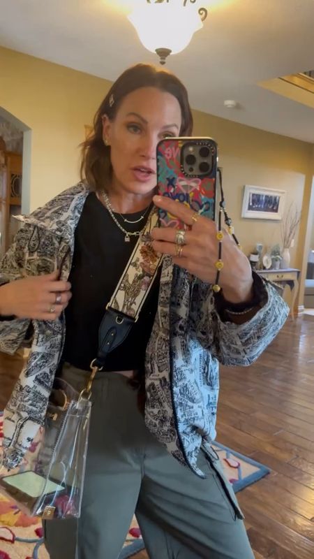 I am loving this for jacket I picked up recently. I wore it over a cropped sparkly detail black t-shirt, olive green cargos and topped off with my packed party purse that I put a Dior strap on. Also wearing Dior sneakers. Wearing size small in t-shirt. Size 4 in cargos. Size 7.5 in shoes. 

#LTKVideo #LTKstyletip #LTKitbag