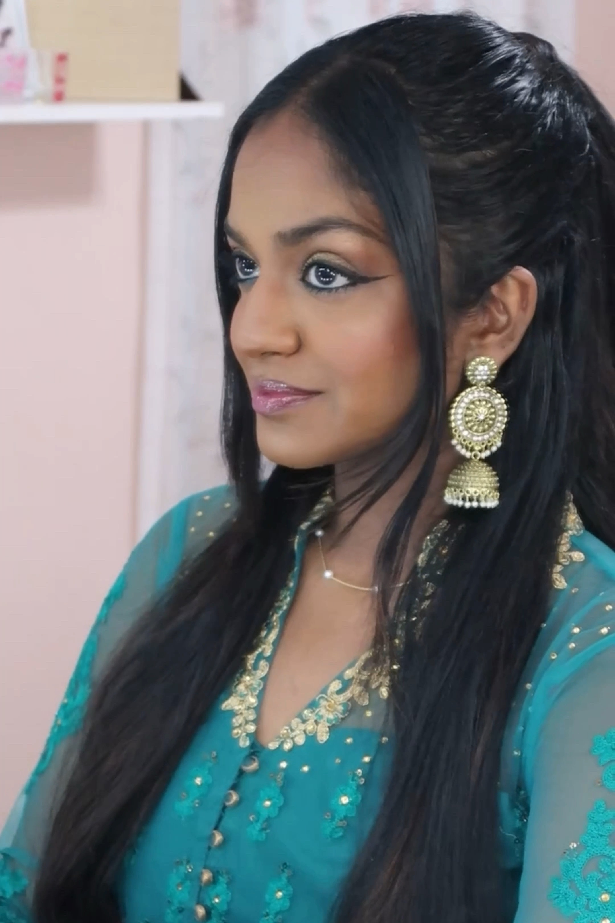 gold eye look with blue kajal

#LTKBeauty