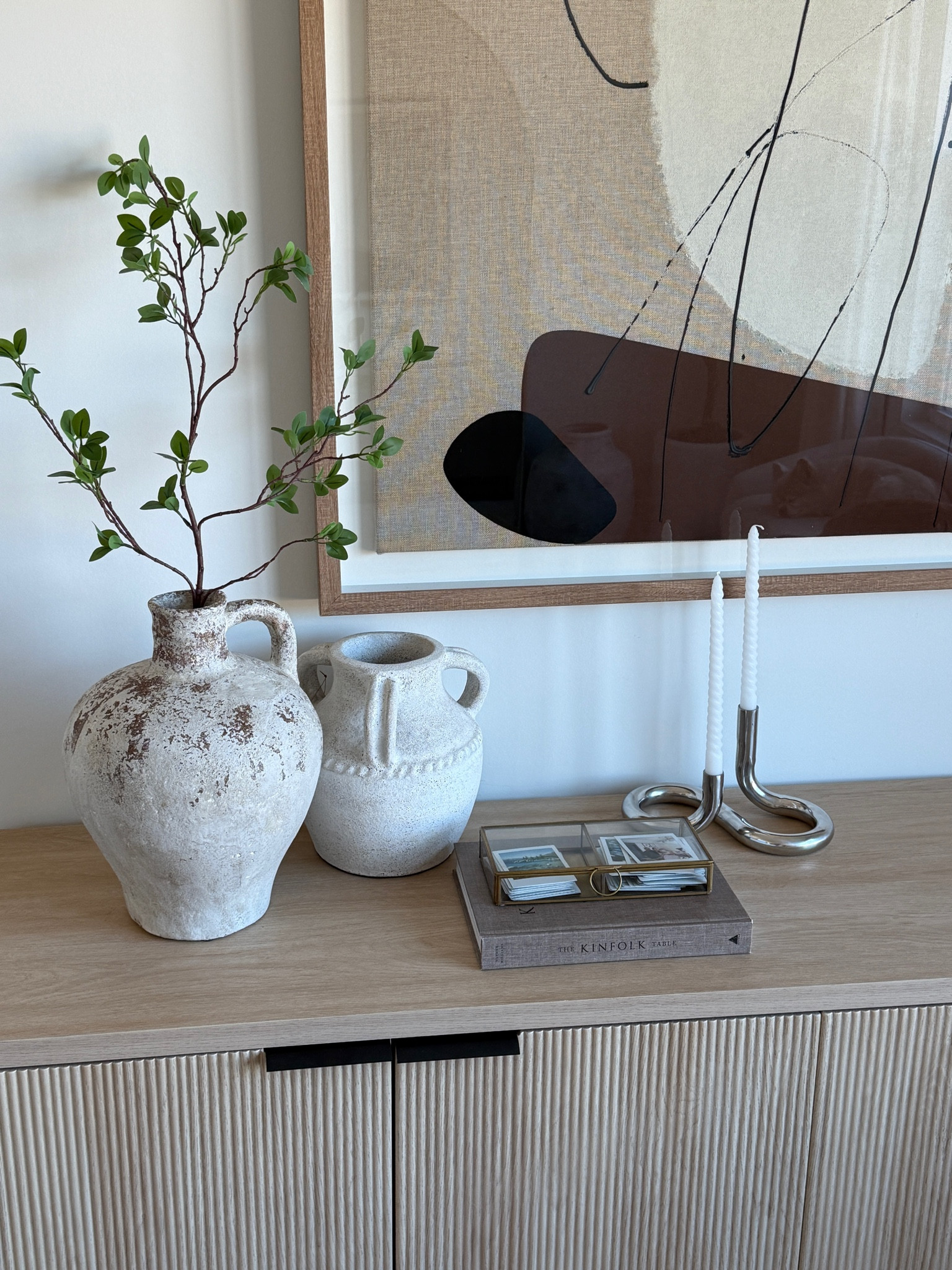 Chrome candle holder. Silver candle holder. Amazon stems. Polaroid memory box. Console table

#LTKHome #LTKStyleTip #LTKFindsUnder50