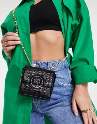 ASOS DESIGN quilted mini cross body bag with ring fixture in black | ASOS (Global)