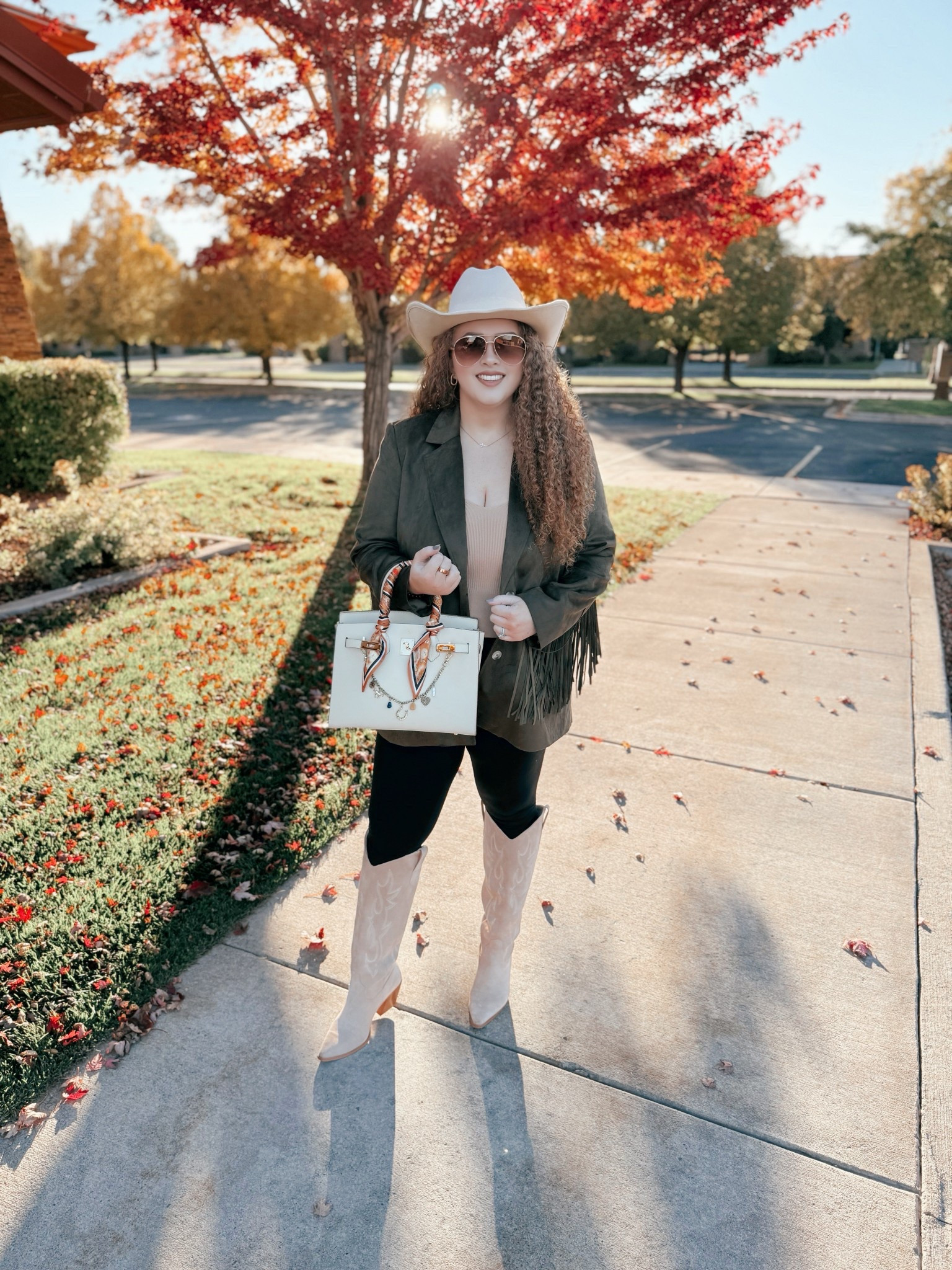 Channeling all the fall western vibes 🍂🤠 Suede, fringe, and boots that feel like they belong in a golden hour moment. Everything linked for your own cozy cowgirl look ✨Nashville outfit | Nashville bachelorette look | country concert outfit | western concert outfit | concert season | neutral cowgirl boots | amazon neutral cowgirl boots | suede cowgirl boots | amazon suede cowgirl boots | amazon boots | amazon finds | amazon fashion | amazon outfit | amazon look | amazon concert outfit | amazon concert finds | western concert outfit | western fashion | amazon western fashion | amazon western outfit | leggings | amazon leggings | fall leggings outfit| amazon tank top | amazon neutral tank top | blazer | amazon blazer | green blazer | amazon green blazer | fringe blazer | amazon fringe blazer | cowgirl hat | amazon cowgirl hat  

#LTKMidsize #LTKStyleTip #LTKSaleAlert