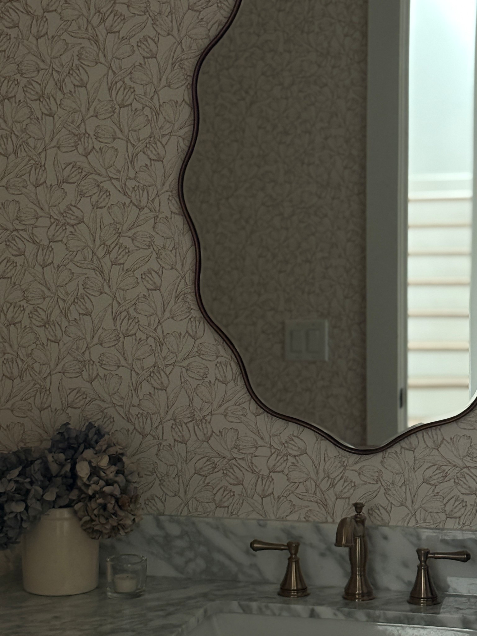 This powder bath mirror is one of my favorite examples of a high-end look for less. The soft, wavy shape adds character and warmth without overpowering the space, and it instantly makes the room feel more custom and considered. Proof that you don’t need a designer mirror to elevate a bathroom — sometimes one intentional piece is enough.

✨ Budget-friendly
✨ Timeless shape
✨ Perfect for powder baths or small bathrooms

#LTKHome