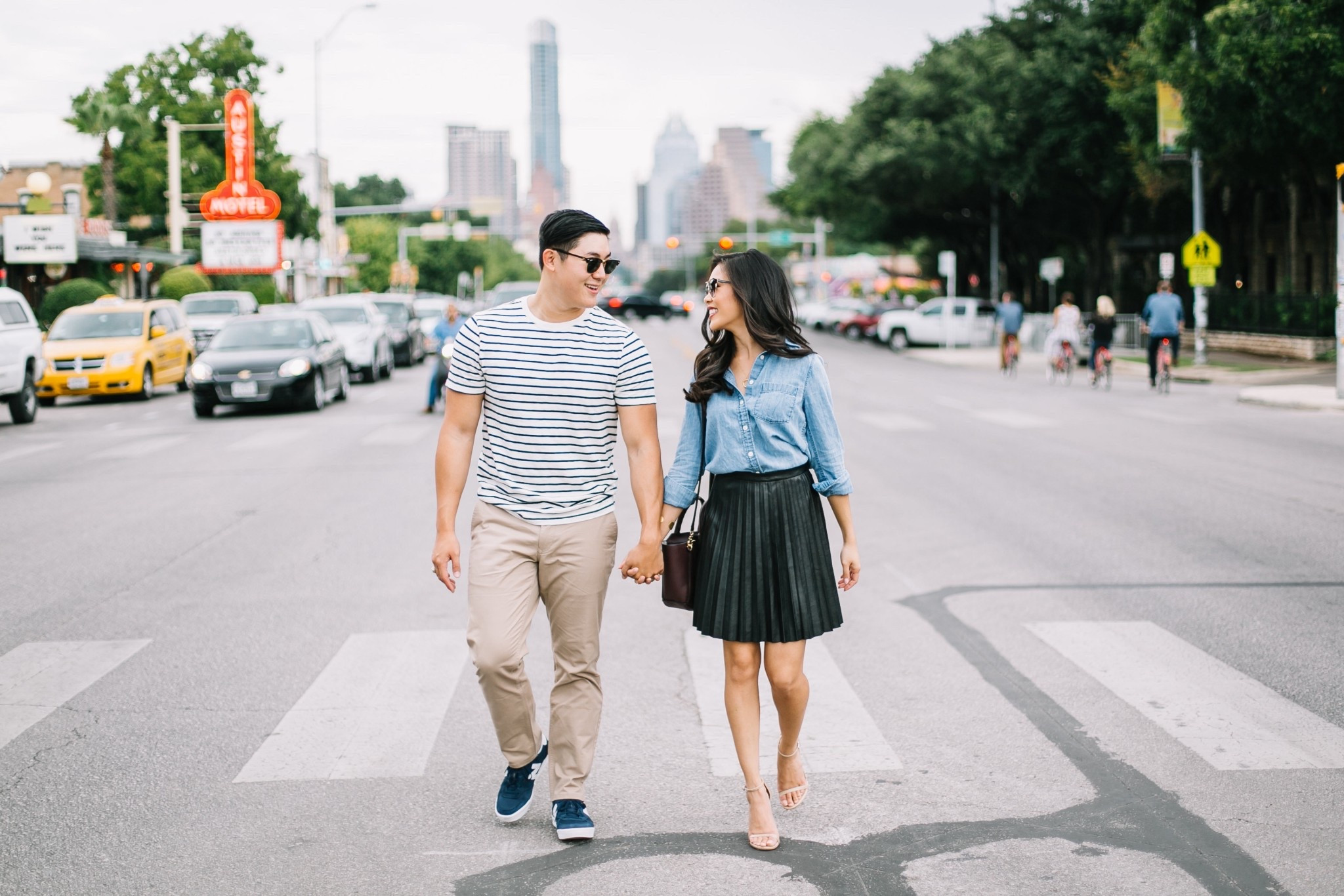 Leather pleated skirt, chambray shirt and nude heels. Johnny is wear striped casual tee with tan chinos and sneakers! 

#LTKootd