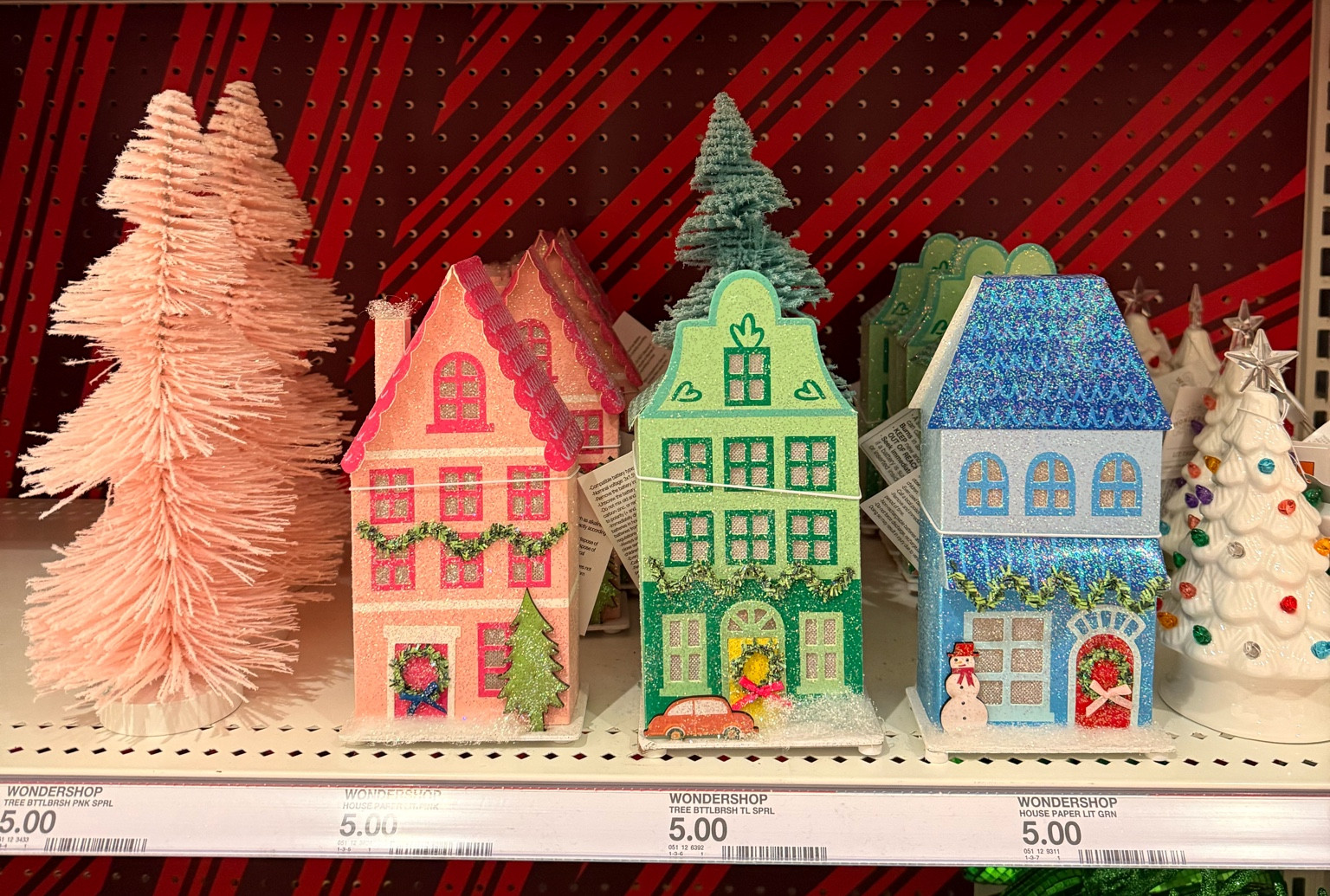 Christmas villages and brush bottle trees. Colorful and only $5

#LTKHoliday #LTKSeasonal #LTKHome
