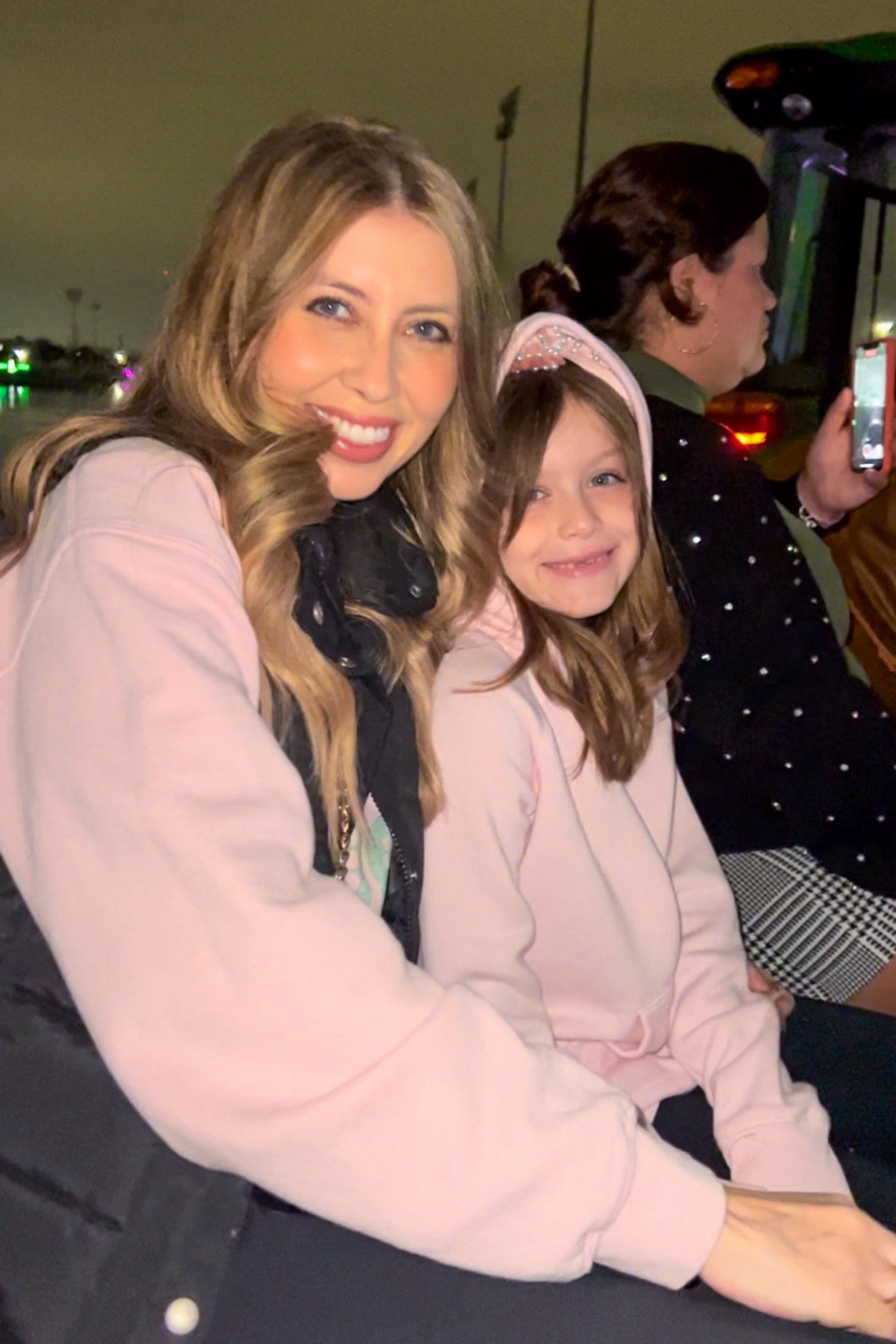 Matching in black and pink! 💕 Threw on my black puffer vest over a pink Christmas sweater and ready with layers for Christmas lights! 🌲🫶🏼✨

#LTKCyberWeek #LTKActive #LTKFamily