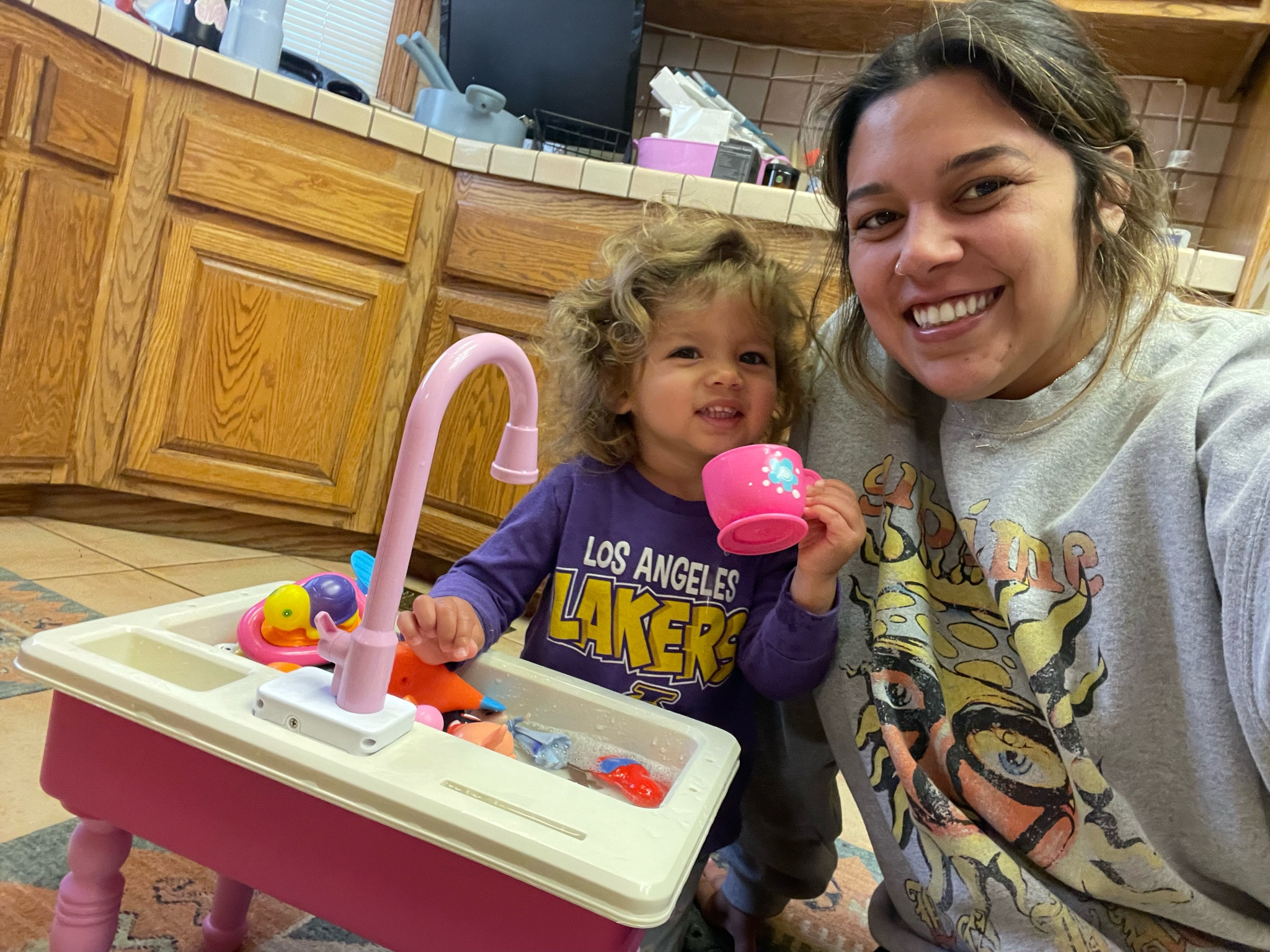 Zoe loves her play sink and dish set! 

#LTKbaby #LTKsalealert #LTKkids