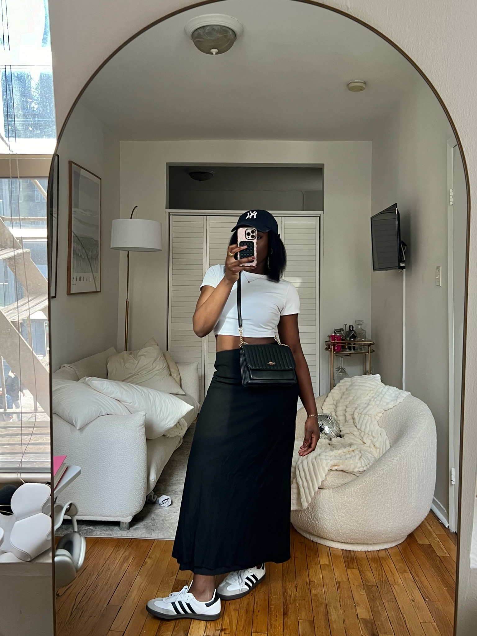 Casual outfit, spring outfits, outfit ideas, sambas, comfy outfit, everyday outfit, maxi skirt, white top, black skirt 

#LTKsalealert #LTKSpringSale #LTKfindsunder100