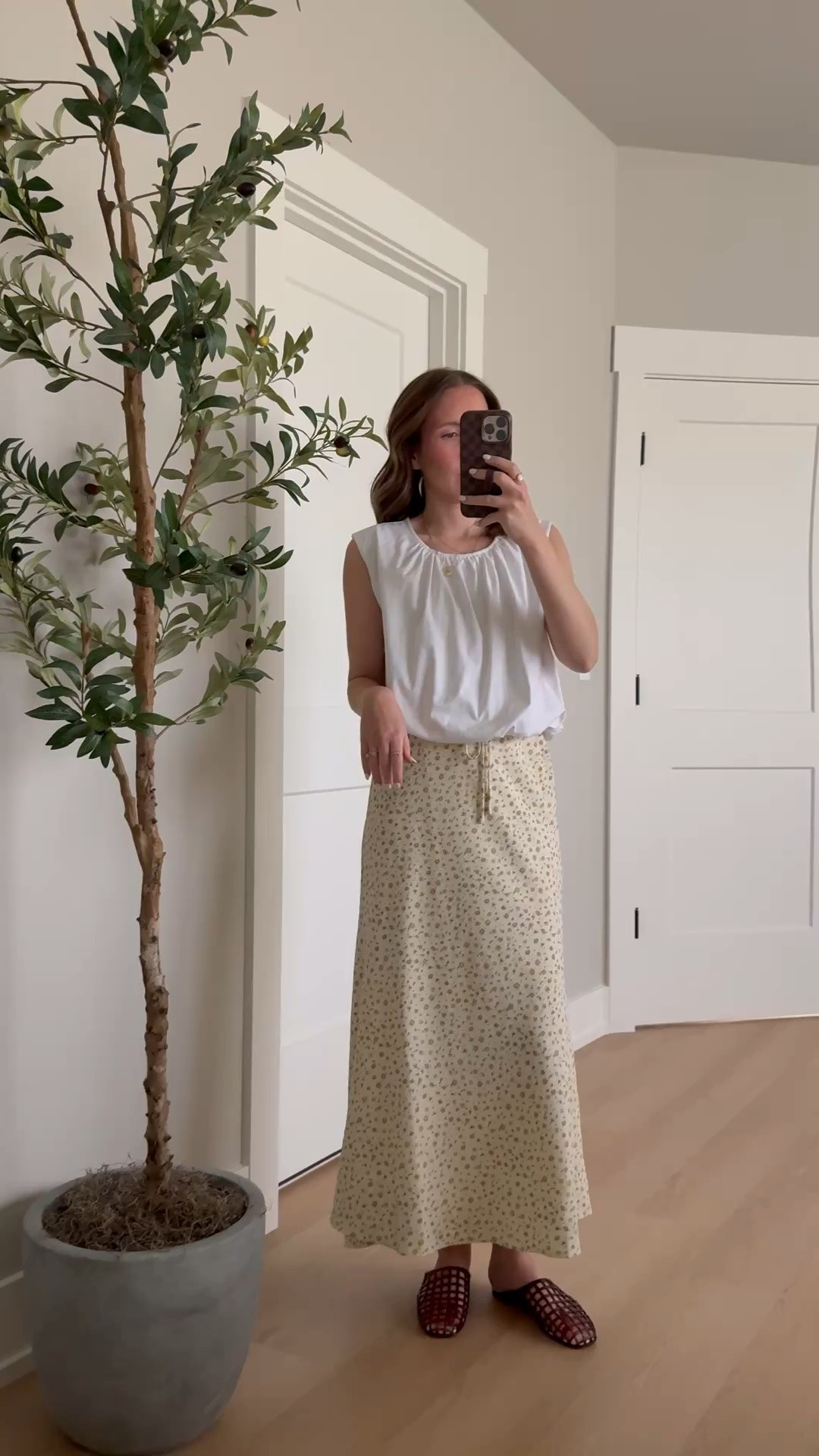 Teacher outfit idea 🍎 a bubble hem tee and the sweetest floral skirt. Use code 20ASHG for 20% off my skirt!

Teacher outfit idea, summer style, midi skirt, bubble hem tee, teacher style
