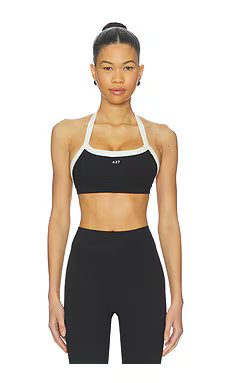 437 The Halter Sports Bra in Black & Cream from Revolve.com | Revolve Clothing (Global)