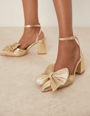 Be Mine Wide Fit Sierra heeled pumps with bow detail in satin gold | ASOS (Global)
