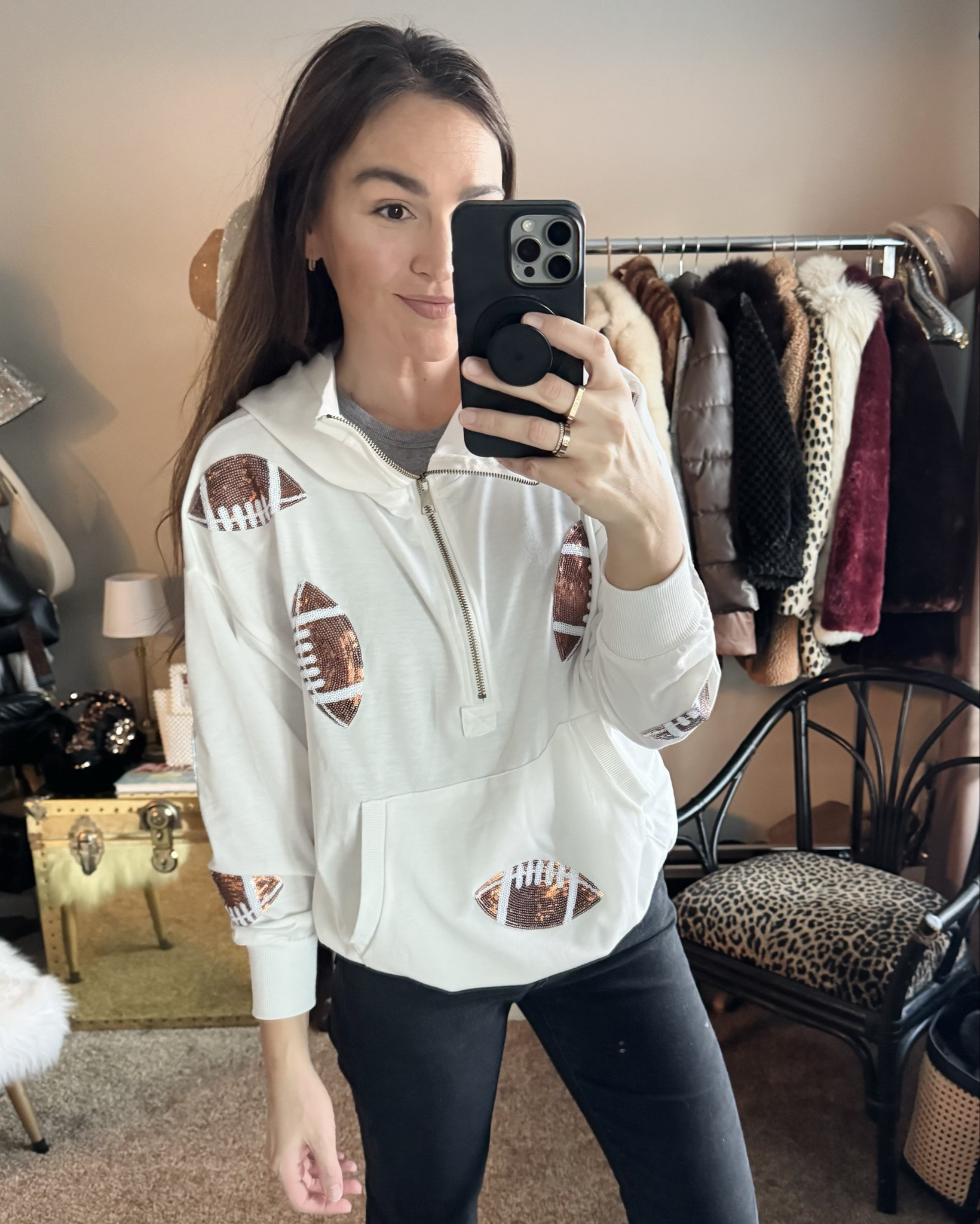 GO SPORTS! 🏈
Runs large, wearing a small

Neutral sports gear
Sequin football hoodie
Super Bowl
Tailgate

