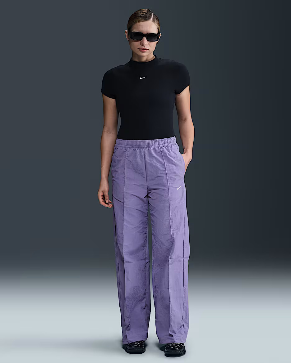 Sustainable MaterialsNike Sportswear Everything WovensWomen's Mid-Rise Open-Hem Pants | Nike (US)