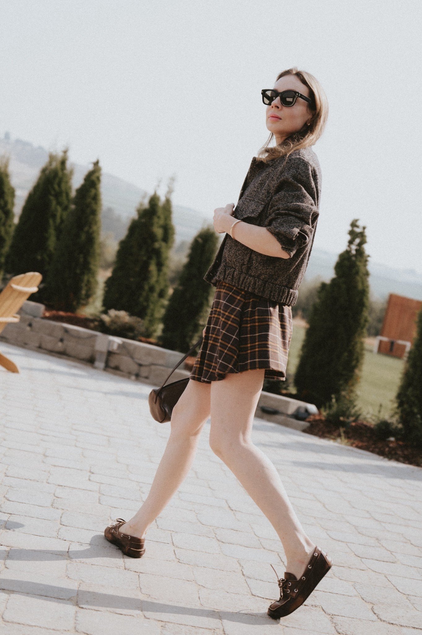 With any luck there’ll be more sunny days before the real cold. 
Late Fall outfit: mini skirt (skort) + wool bomber jacket + mini bag + boat shoes.
Shoes: Miu Miu 
Skort: Free People
Bomber jacket: Marella
Bag: St. Agni (sold out and hoped will be restocked, linking similar styles in the meantime). 

#LTKWorkwear #LTKStyleTip #LTKShoeCrush