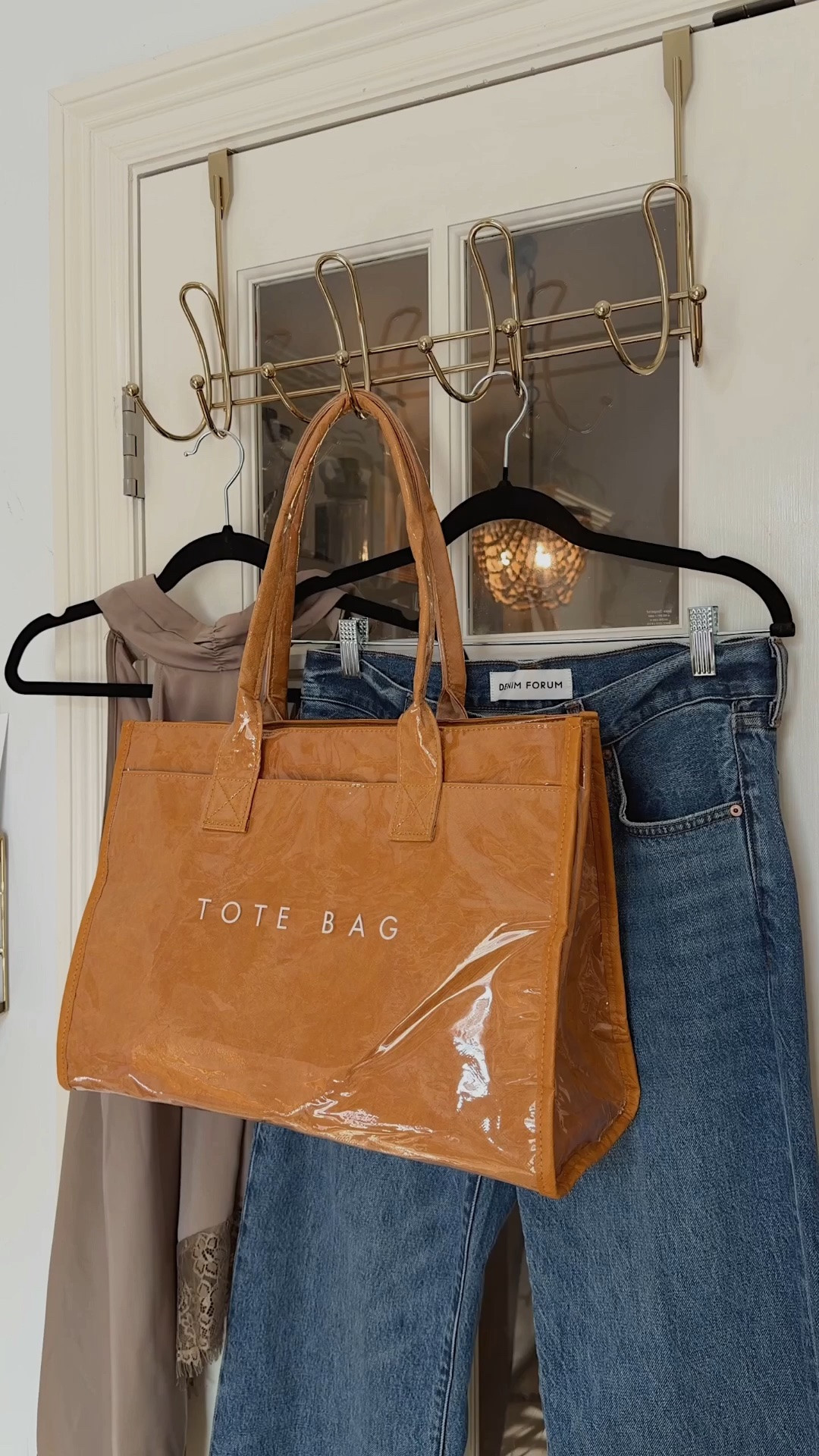 Love the warm neutral tone of this tote bag. It has a zipper closure and plenty of pocket space.

#LTKOver40 #LTKTravel #LTKWorkwear