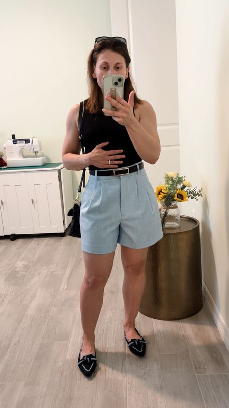 Curve love shorts, affordable leather purse, very comfortable flats 

My top is from Express, here is the link to it: https://creatoriq.cc/3L1zumH

#LTKSummerSales #LTKShoeCrush #LTKStyleTip