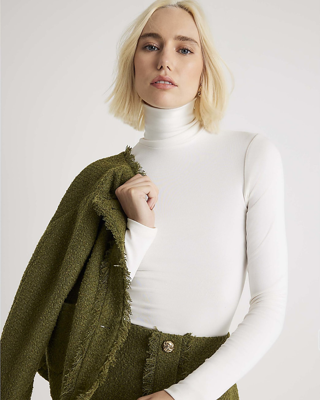 White Long Sleeve Roll Neck Top | River Island UK & IE