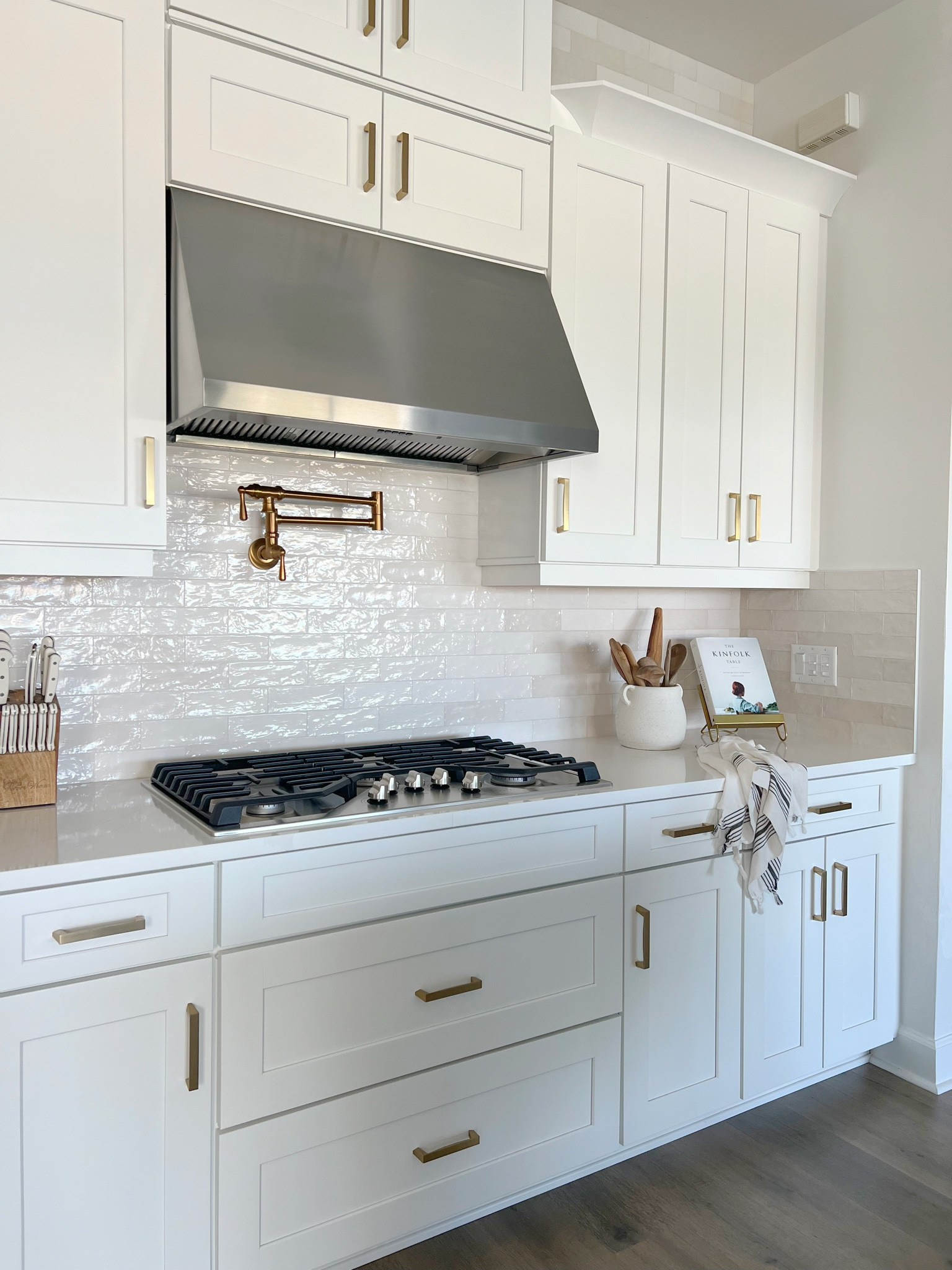 My tile backsplash is on sale this weekend. Can you believe this beautiful backsplash tile is from Home Depot! This is super affordable for a Zellige style tile, and comes in a few different color options and sizes! 

The name of the tile is:
Kingston tile
White
3 by 8 inch
Glazed ceramic tile


#backsplash #walltile #tile #zelligetile #homedepot 

#LTKSaleAlert #LTKHome