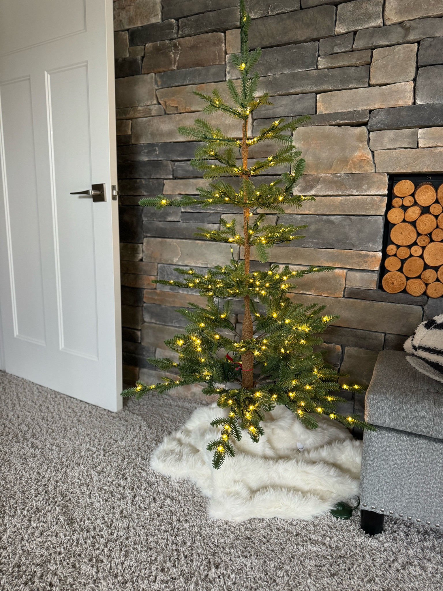 Balsam hill alpine fir mini tree
Just add clear twinkle lights 
White faux fur tree skirt 
Christmas tree and home decor 