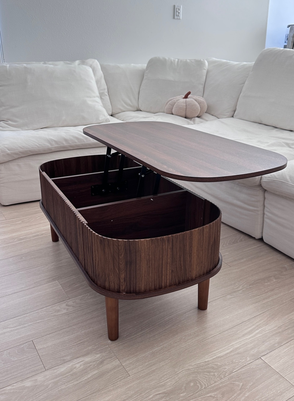 Fluted coffee table with hidden storage 🤍

#LTKHome #LTKFamily #LTKFindsUnder100