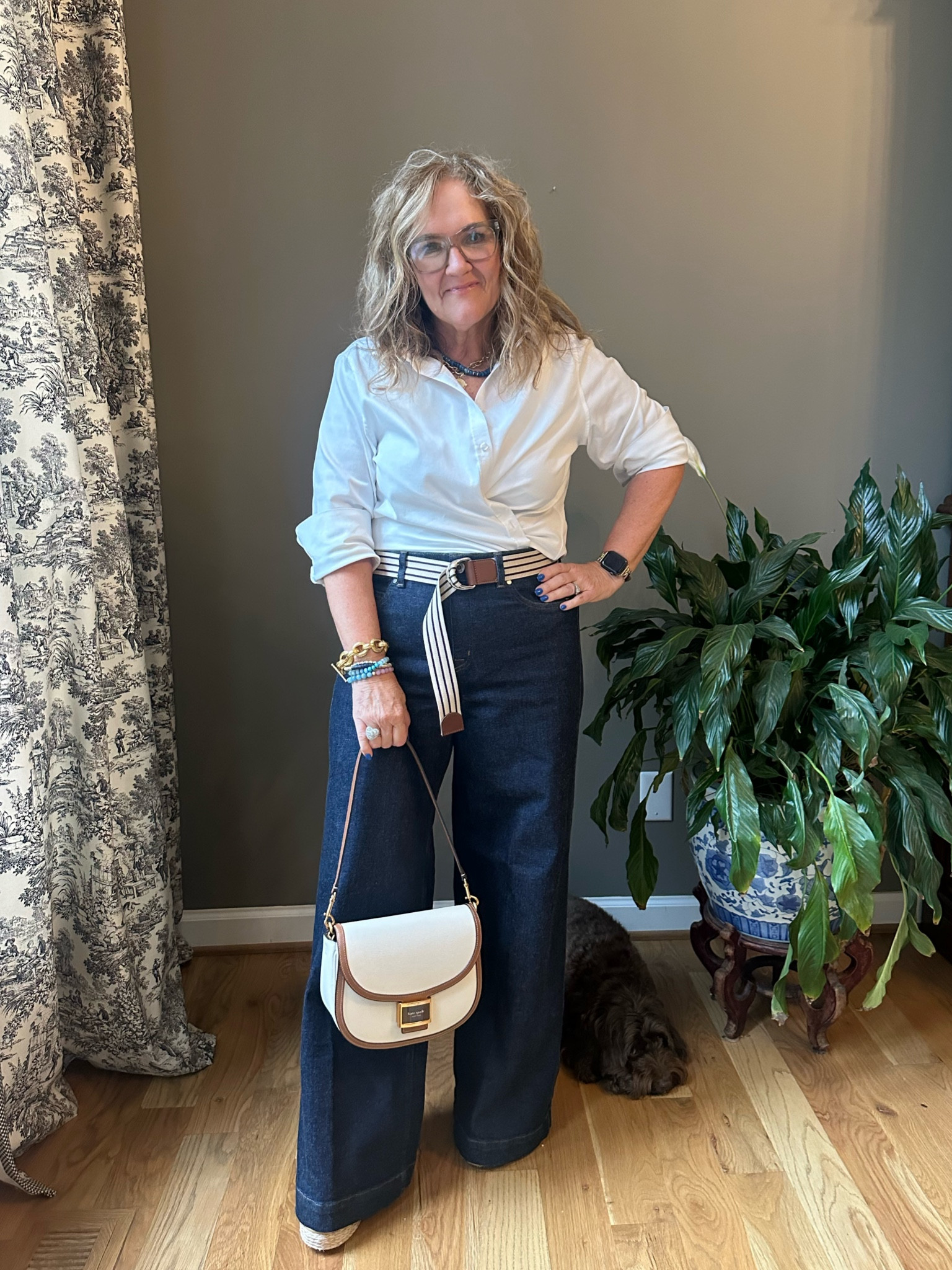  Classic jeans and a white blouse. With a twist. I’m going to share how I tucked this soon! The key is a blouse that’s a bit oversized. I’m in a 2.5 Chicos size.  It’s a no iron stretch blouse. 

Jeans are spanx. You can never go wrong sizing up with spanx. I’m in the XL petite. 10% off code NANETTEXSPANX 

my purse is getting limited. I’ll link a few that are similar  

#LTKOver40 #LTKBacktoSchool #LTKMidsize