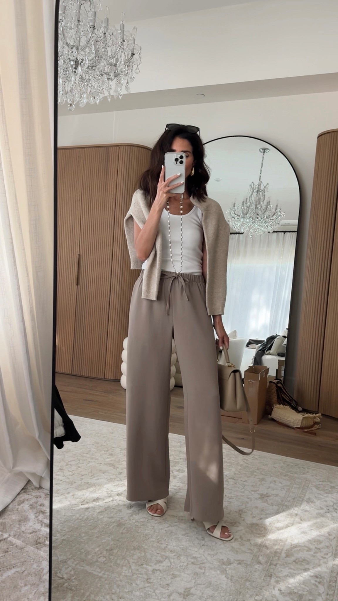 Styling the viral @Aritzia pants! I’m just shy of 5-7” wearing the size SMALL REGULAR pants in the color nomad taupe , small sweater and XS tank top. #stylinbyaylin #springoutfit #basics

#LTKgrwm #LTKOver40 #LTKootd