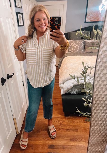 Look at this beautiful oversized, light weight linen blend blouse!
It also comes in black, navy, blue stripes and white.
This will also look adorable with white denim shorts. It could be paired with black pants for the perfect work outfit. Only $20! Runs large. Paired with the most comfortable shoes I have ever owned!
Spring outfits, casual outfits, Target, affordable fashion, jeans, Ugg, Ugg sandals , jeans outfits 

#LTKxTarget #LTKfindsunder50 #LTKSeasonal