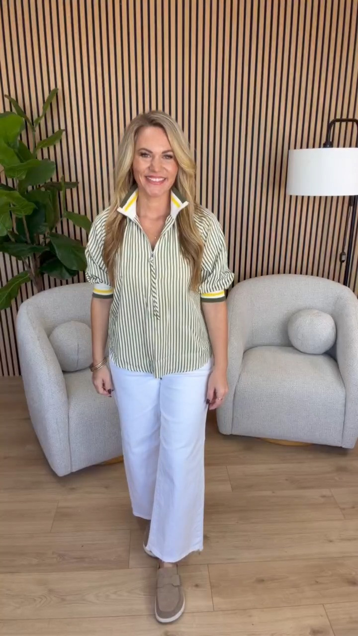 Loving this olive green and white striped quarter zip top! The contrast yellow and green trim gives it such a cute sporty look, and the puff sleeves add a little something different. I paired it with white wide leg denim for an easy casual outfit that works for the office, lunch, or weekend plans. Such a fun way to wear stripes for fall!

Sizing: 5’3” | Medium top | Size 6 denim

Olive green striped top, green and white quarter zip, striped pullover, puff sleeve top, women’s casual fall outfits, white wide leg jeans, sporty casual fashion, fall striped tops, petite everyday style, fall workwear, Audrie Dollins