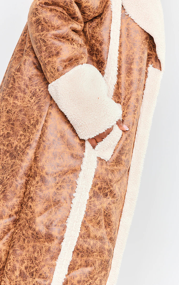 Plus Brown Distressed Faux Leather Borg Trim Coat | PrettyLittleThing US